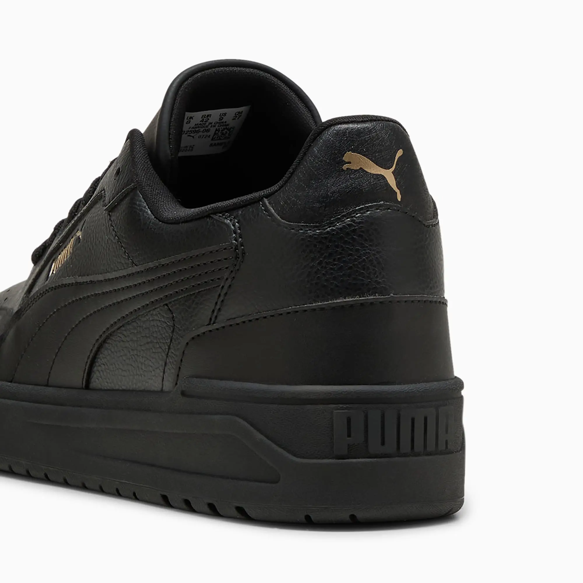 PUMA Shuffle Downtown Sneakers Unisex, Black/Gold, size 10