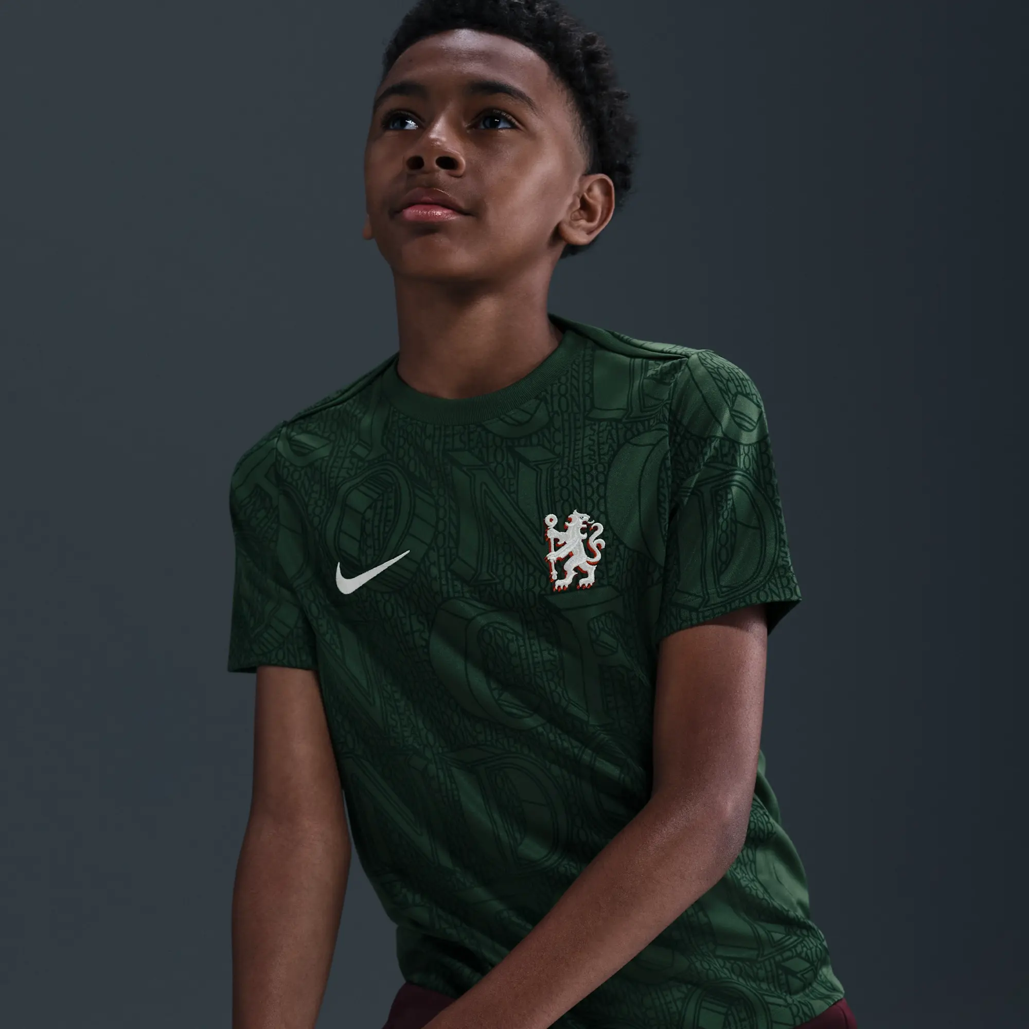 Chelsea F.C. Academy Pro Older Kids' Nike Dri-FIT Football Pre-Match Top - Green - Polyester