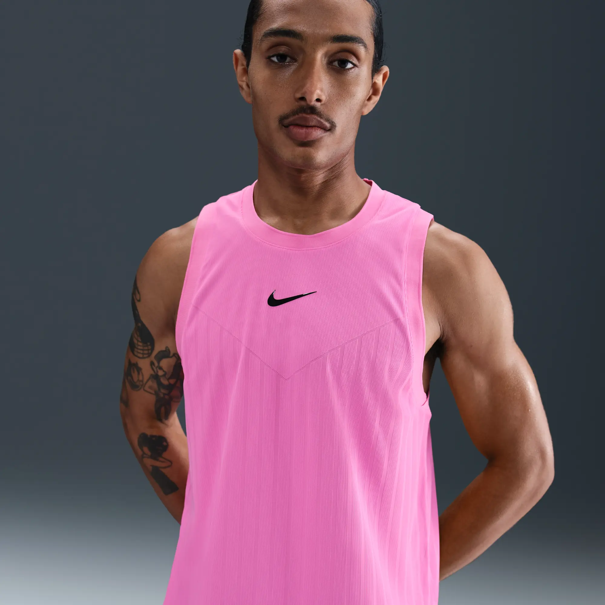 NikeCourt Slam Men's Dri-FIT ADV Tennis Tank Top - Playful Pink - Sustainable Materials
