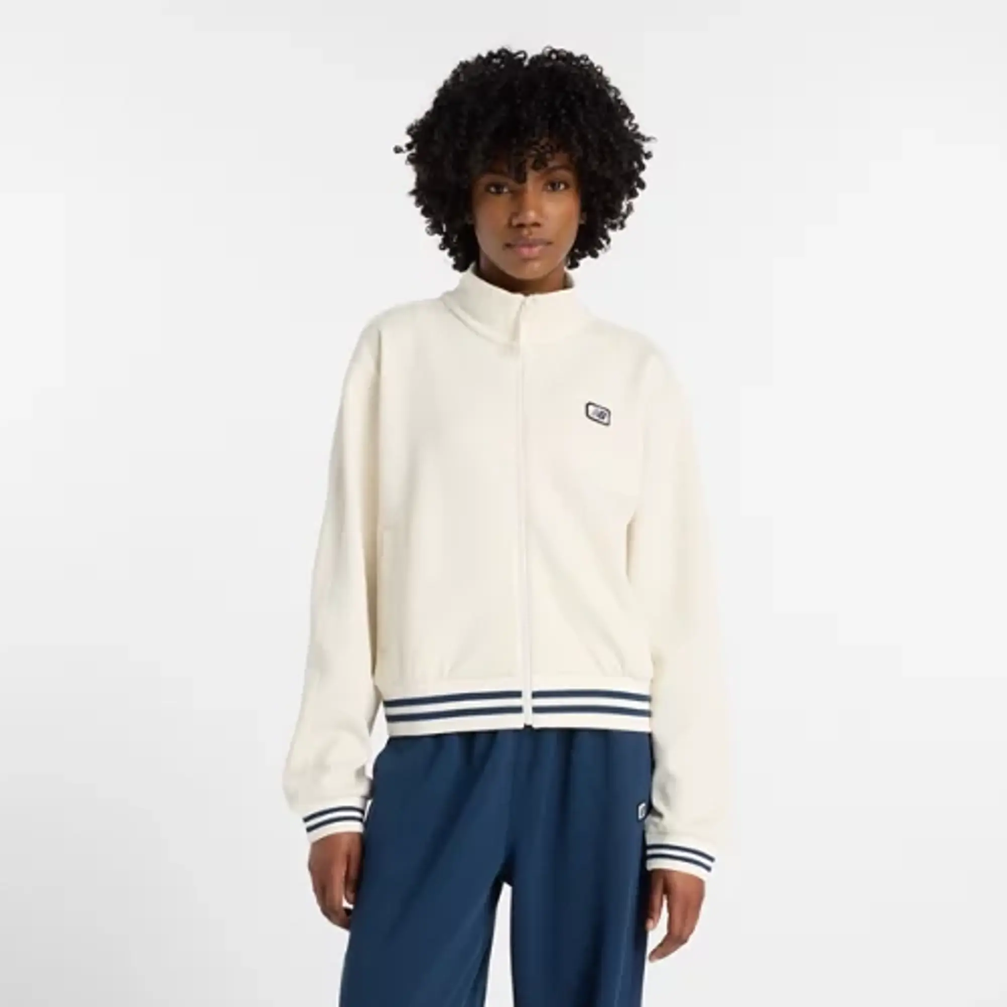 New Balance Women's Post Season Pique Track Jacket in White Poly Knit
