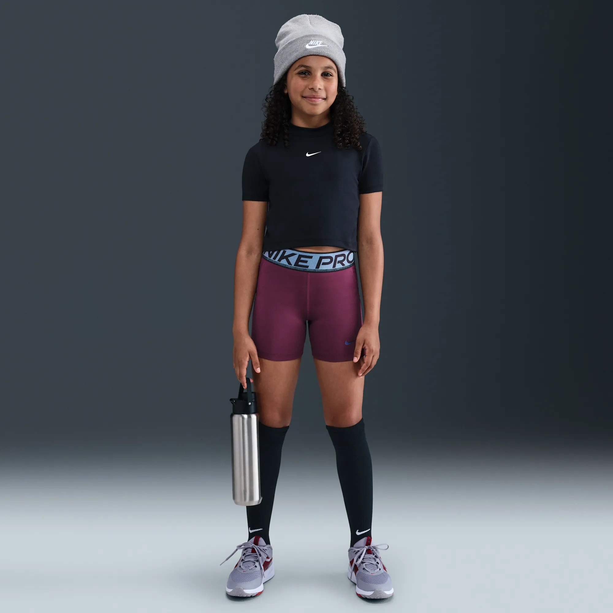 Nike Pro Older Kids' (Girls') Dri-FIT 7.5cm (approx.) Shorts with Shine Accents - Red - Polyester