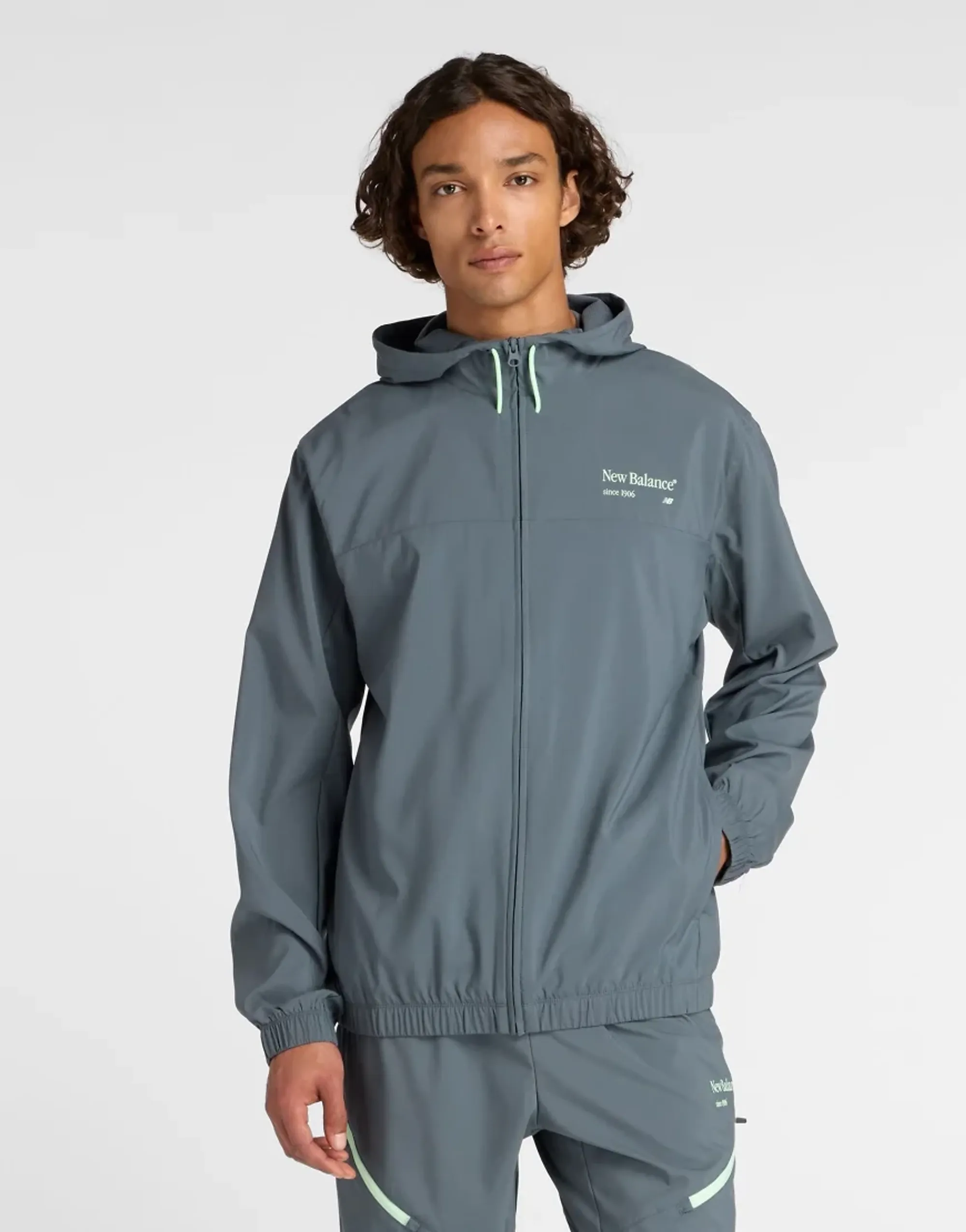 New Balance Men's Reimagined Woven Graphic Jacket in Grey Polywoven