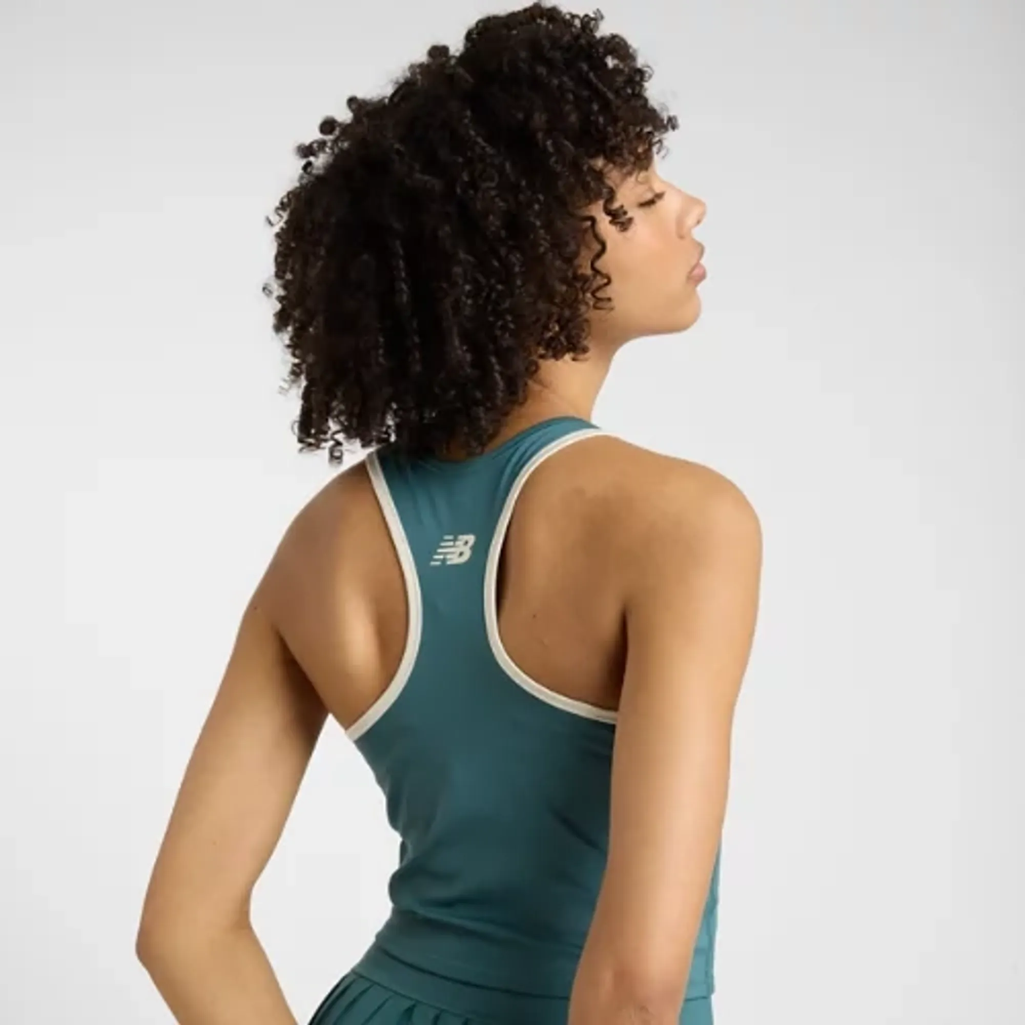 New Balance Women's Novelty Tournament Tank in Green Poly Knit