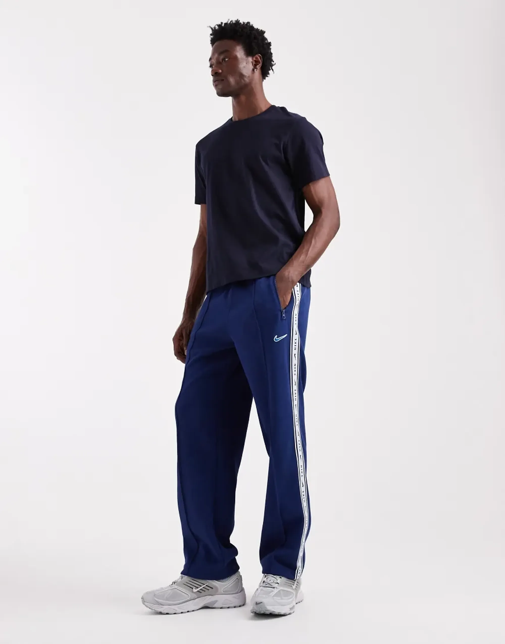 Nike Striped Tapered Joggers In Navy