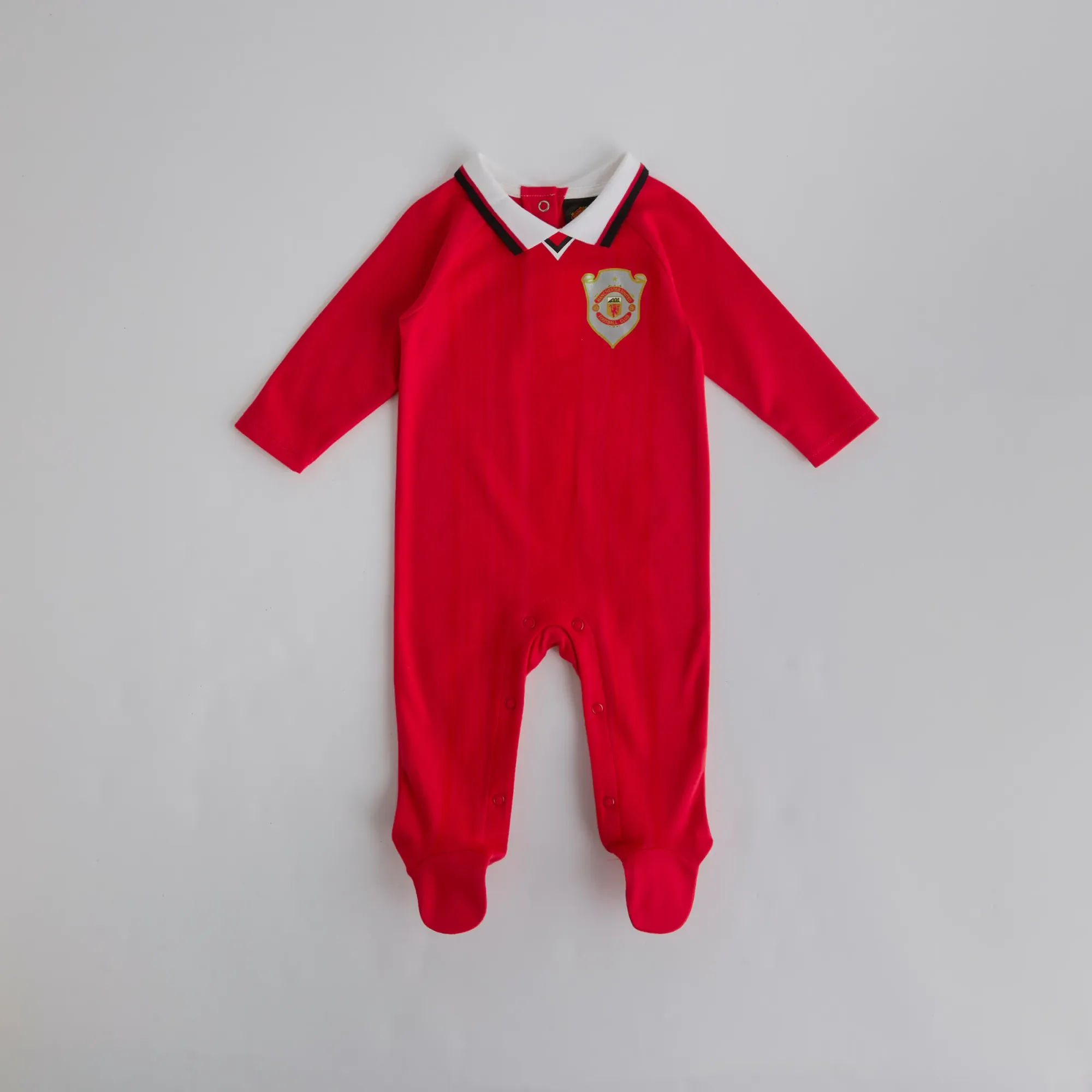 Manchester United Baby 1999 Retro Champions League Sleepsuit Red