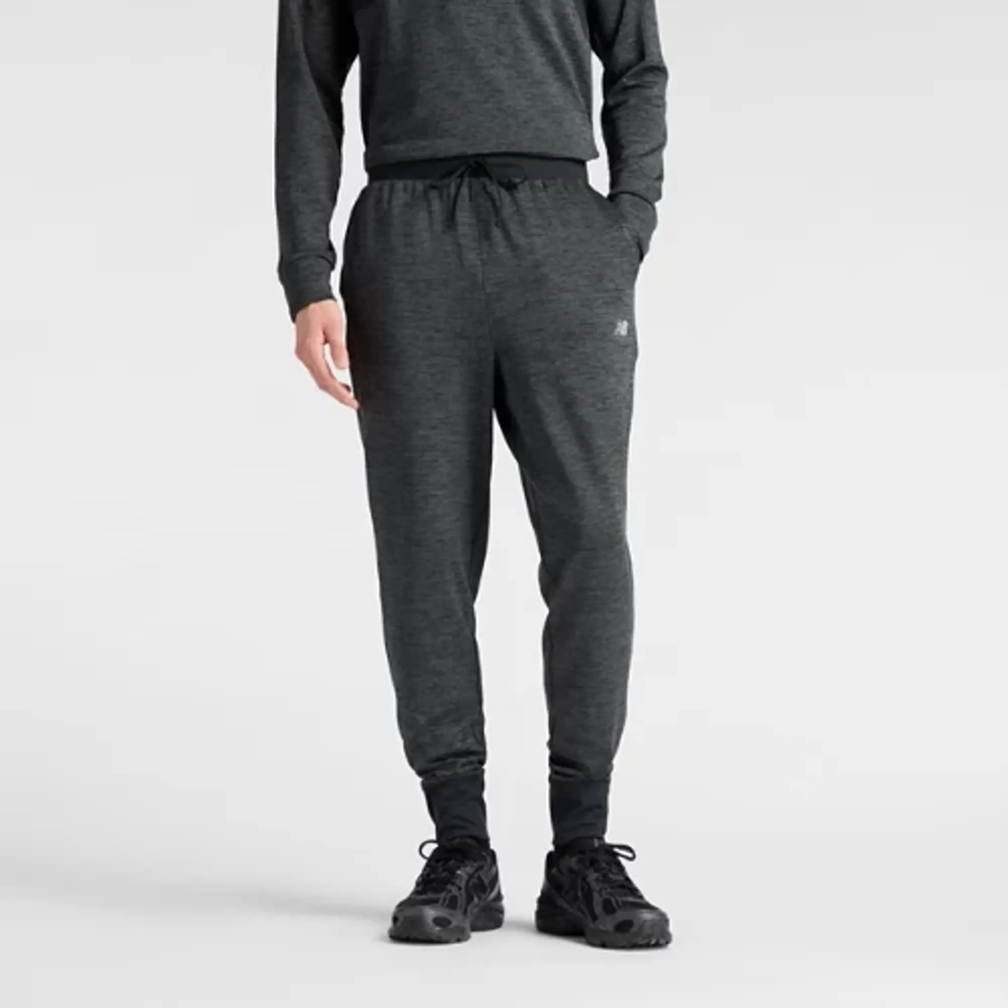 New Balance Men's Athletics Heat Grid Jogger in Black Poly Knit