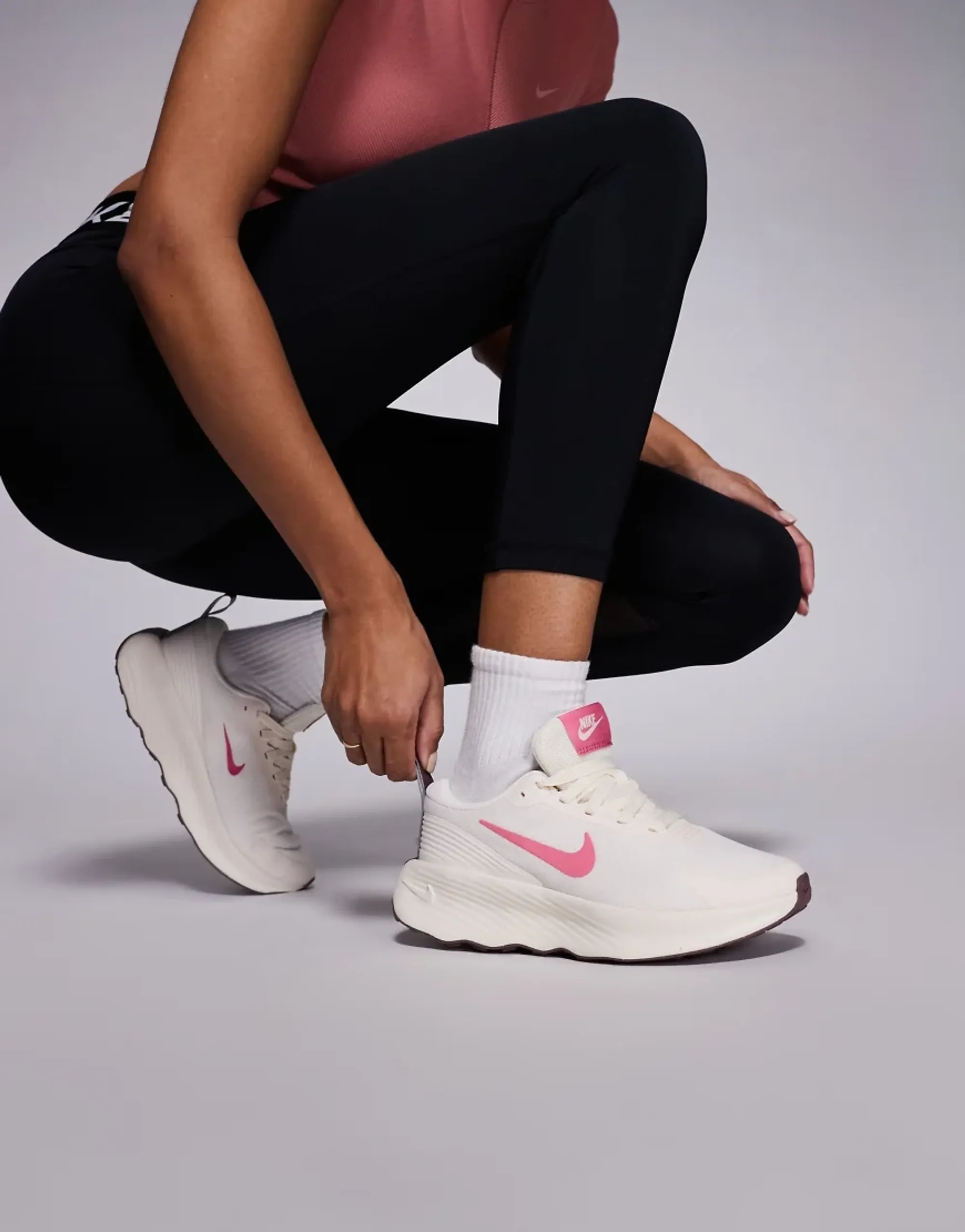 Nike Training Promina Trainers In Pink