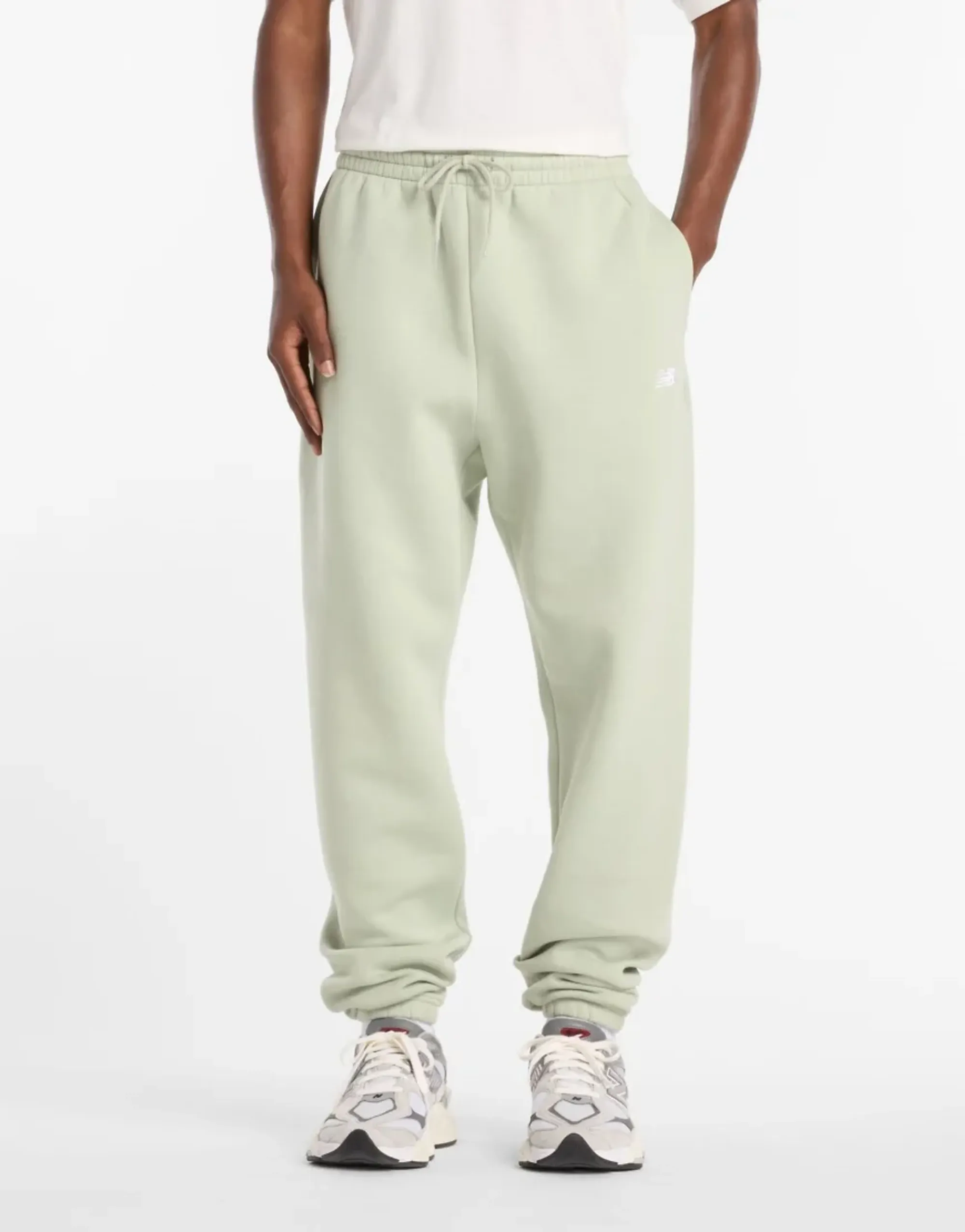 New Balance Men's Sport Essentials Fleece Jogger in Green Cotton