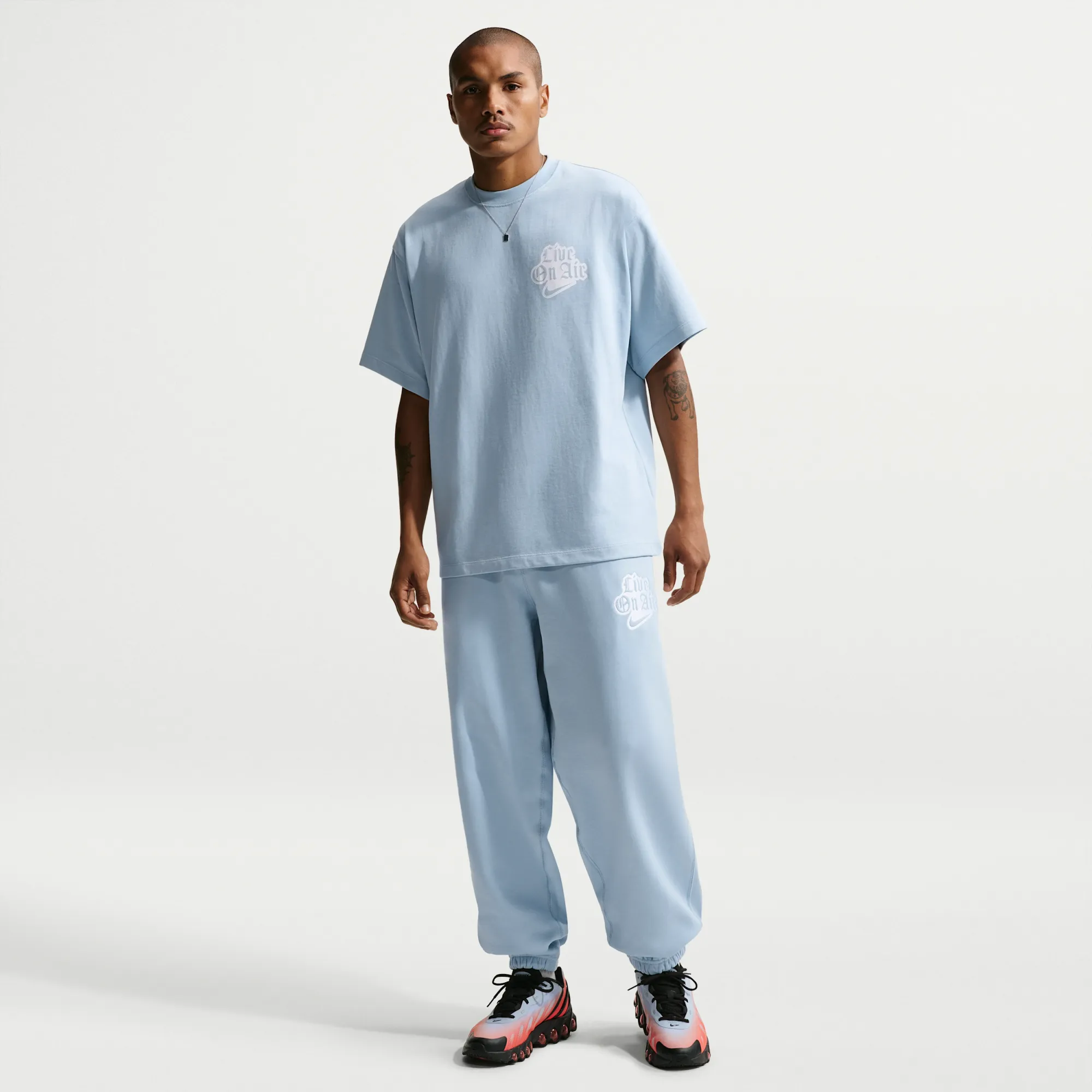 Nike Solo Swoosh Men's Cuffed Fleece Trousers - Blue - Cotton/Polyester