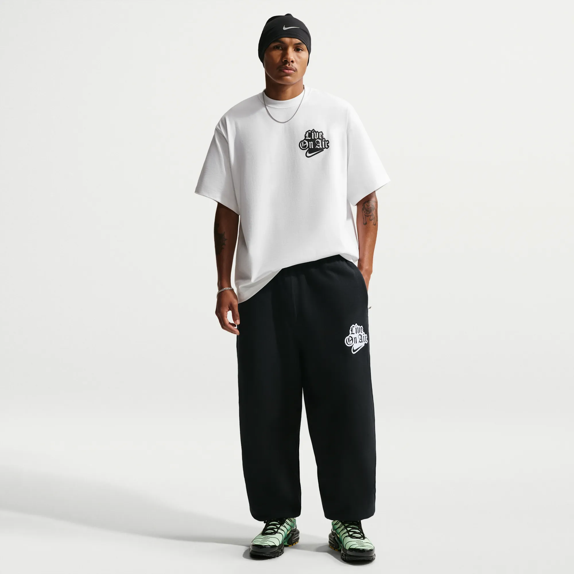 Nike Solo Swoosh Men's Cuffed Fleece Trousers - Black - Cotton/Polyester
