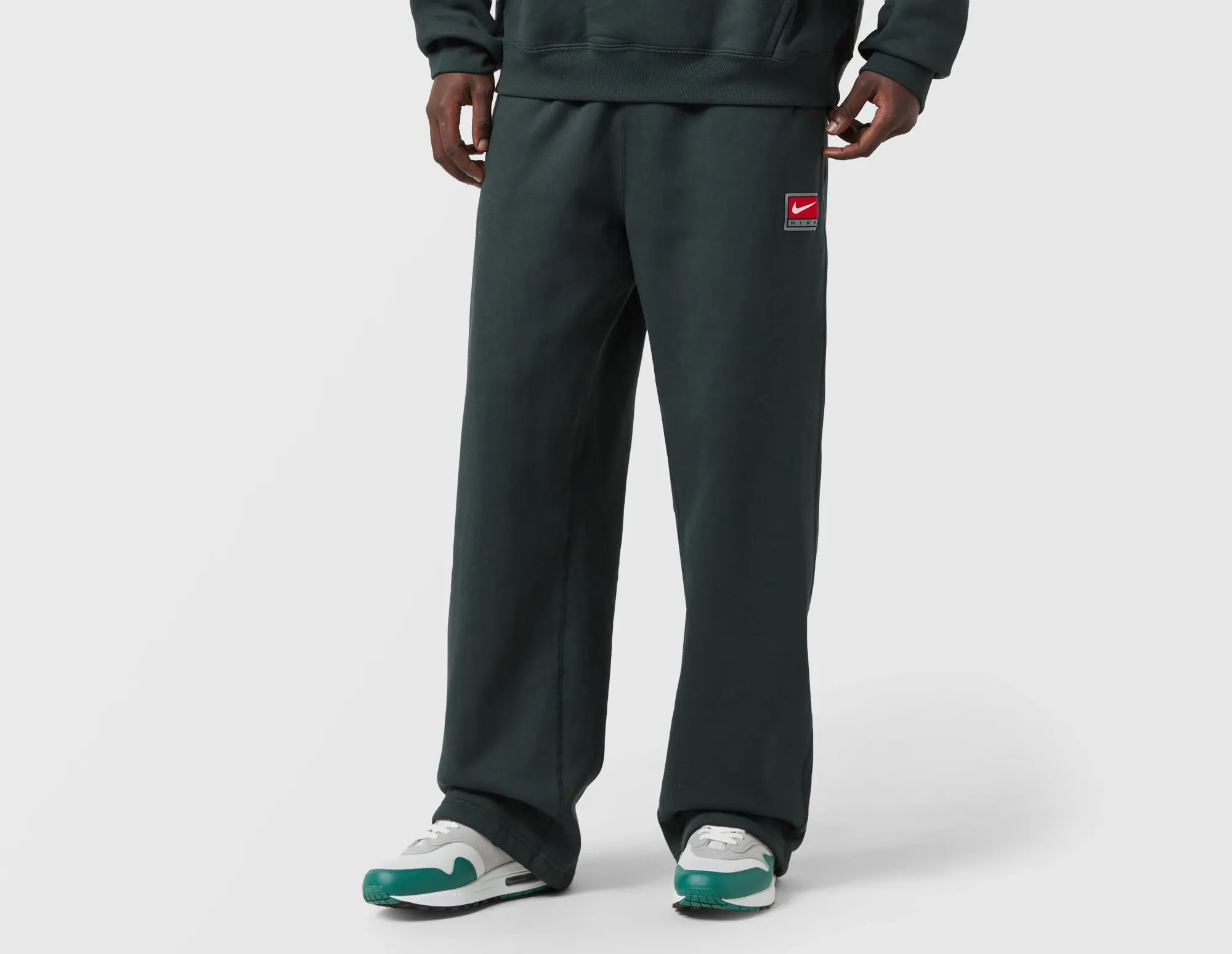 Nike Solo Swoosh Open Hem Fleece Pants, Green
