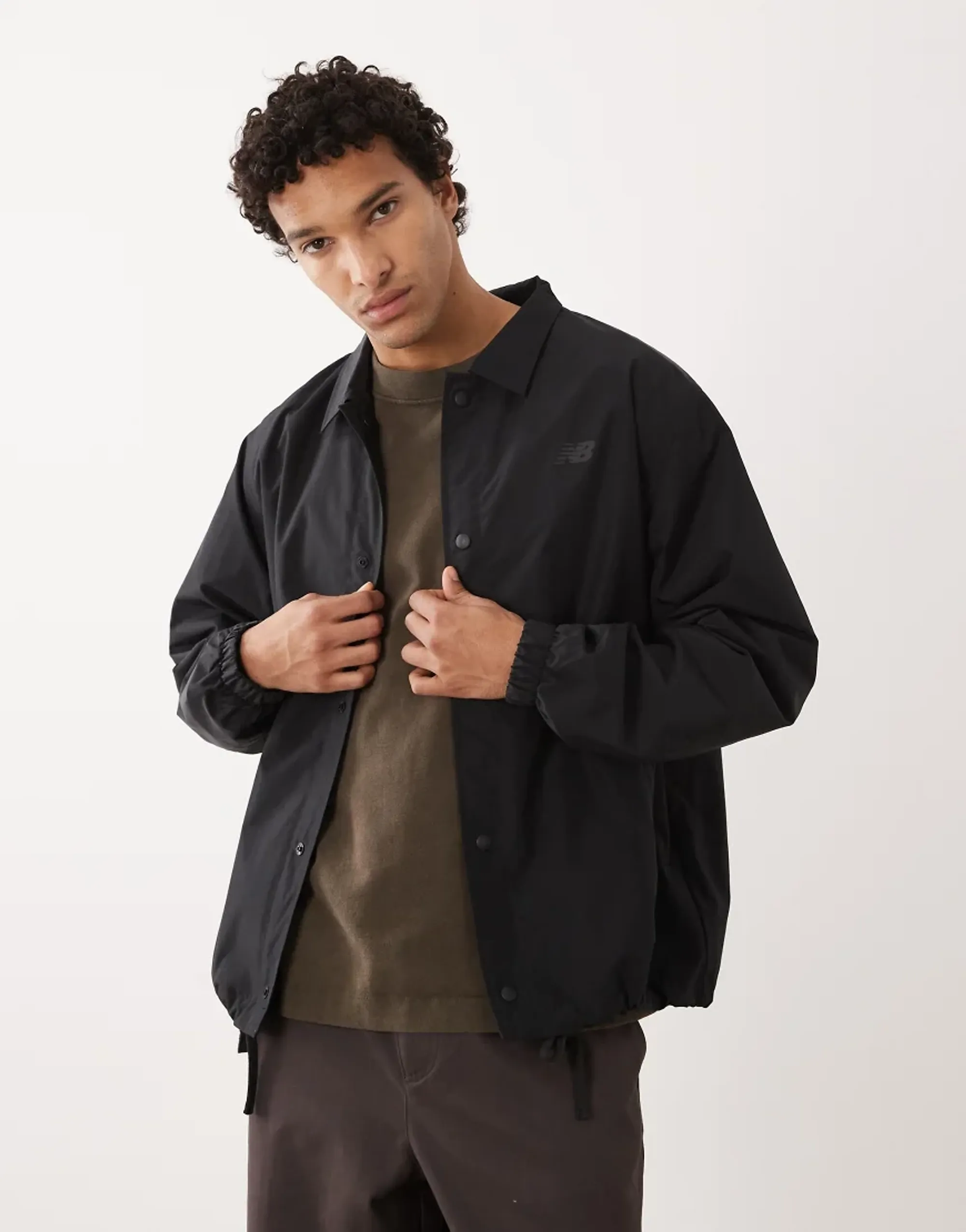 New Balance Men's Lightweight Coaches Jacket in Black Nylon Woven