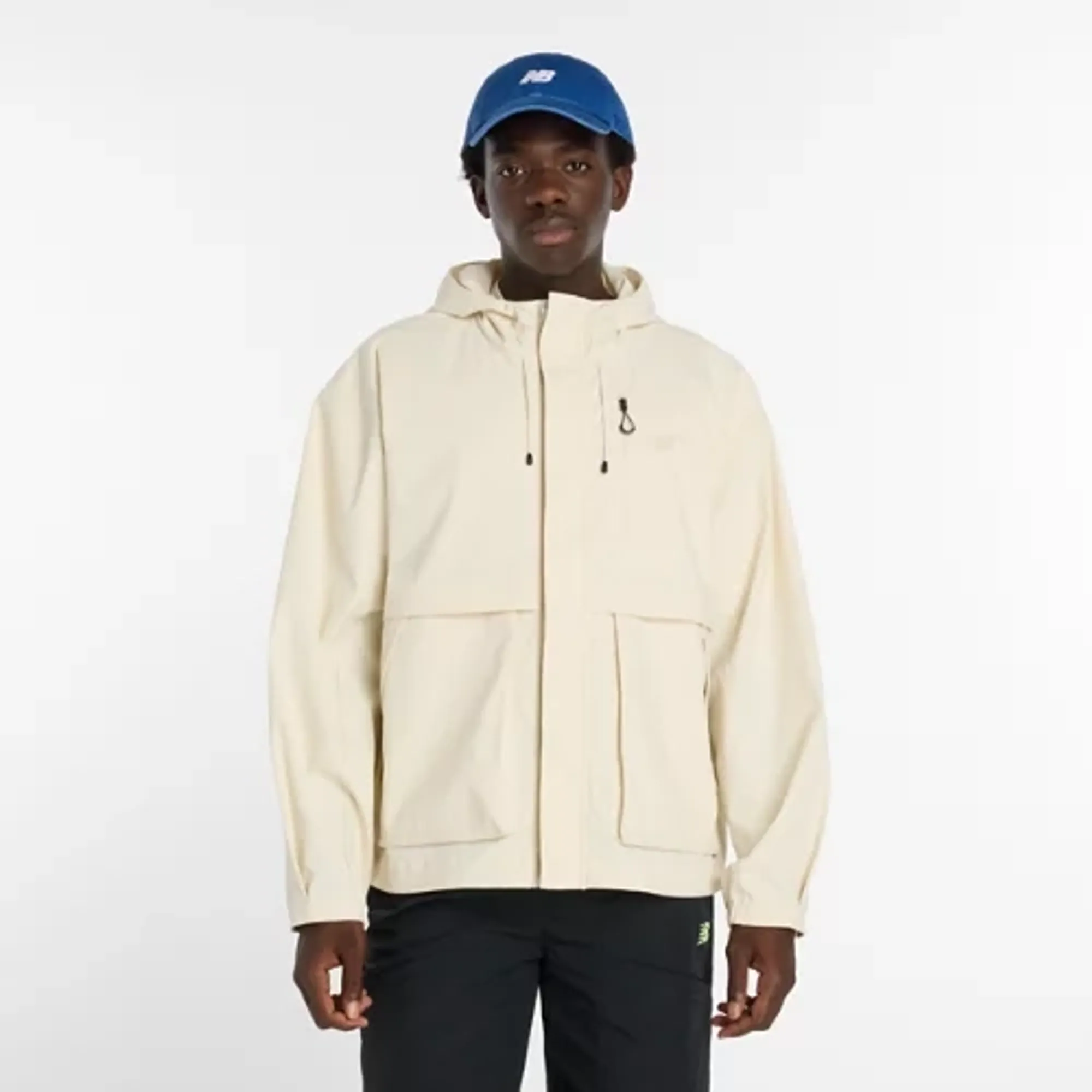 New Balance Men's Athletics Ripstop Jacket in Beige Nylon Woven