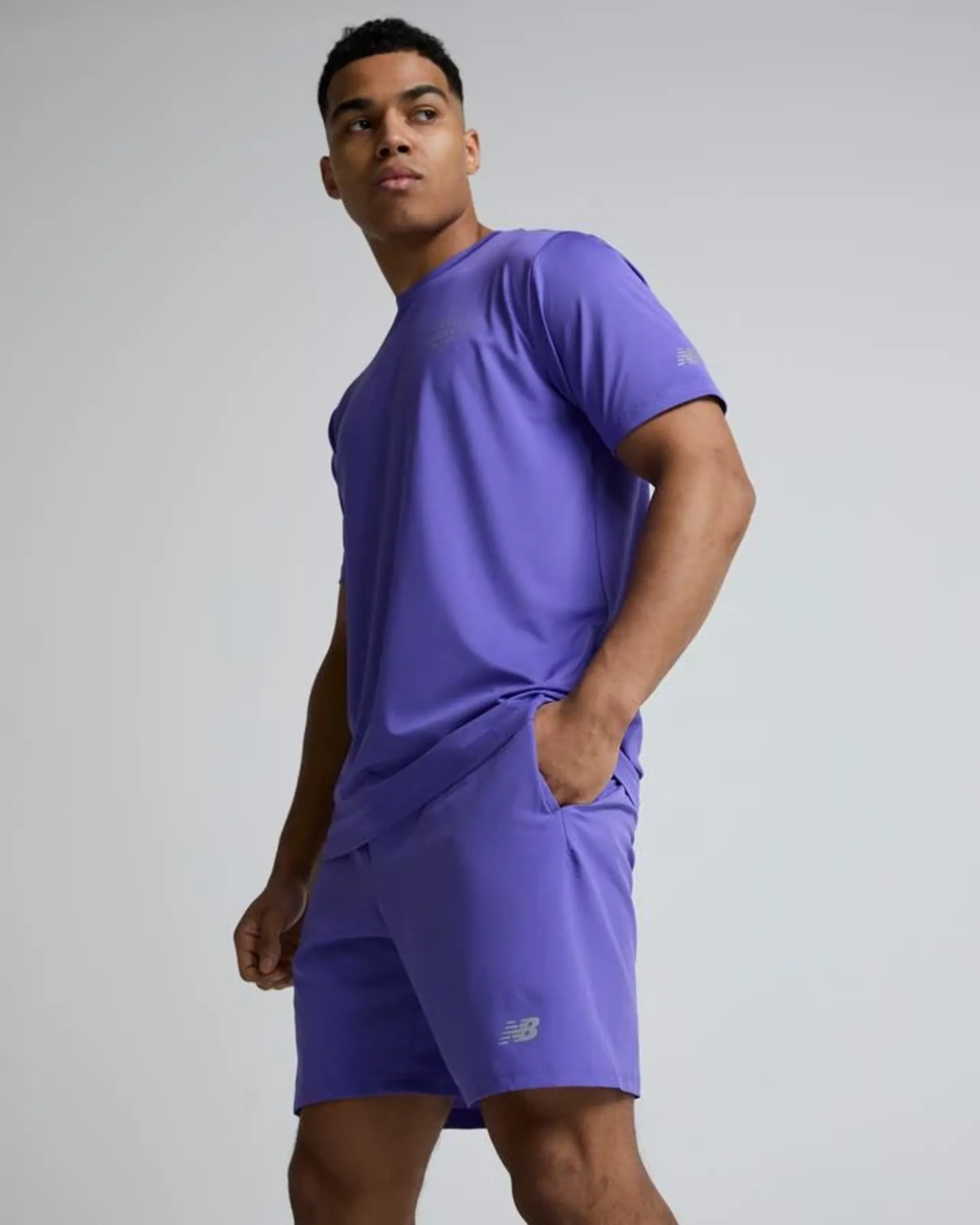 New Balance Men's Sport Essential Short 7" in Purple Polywoven