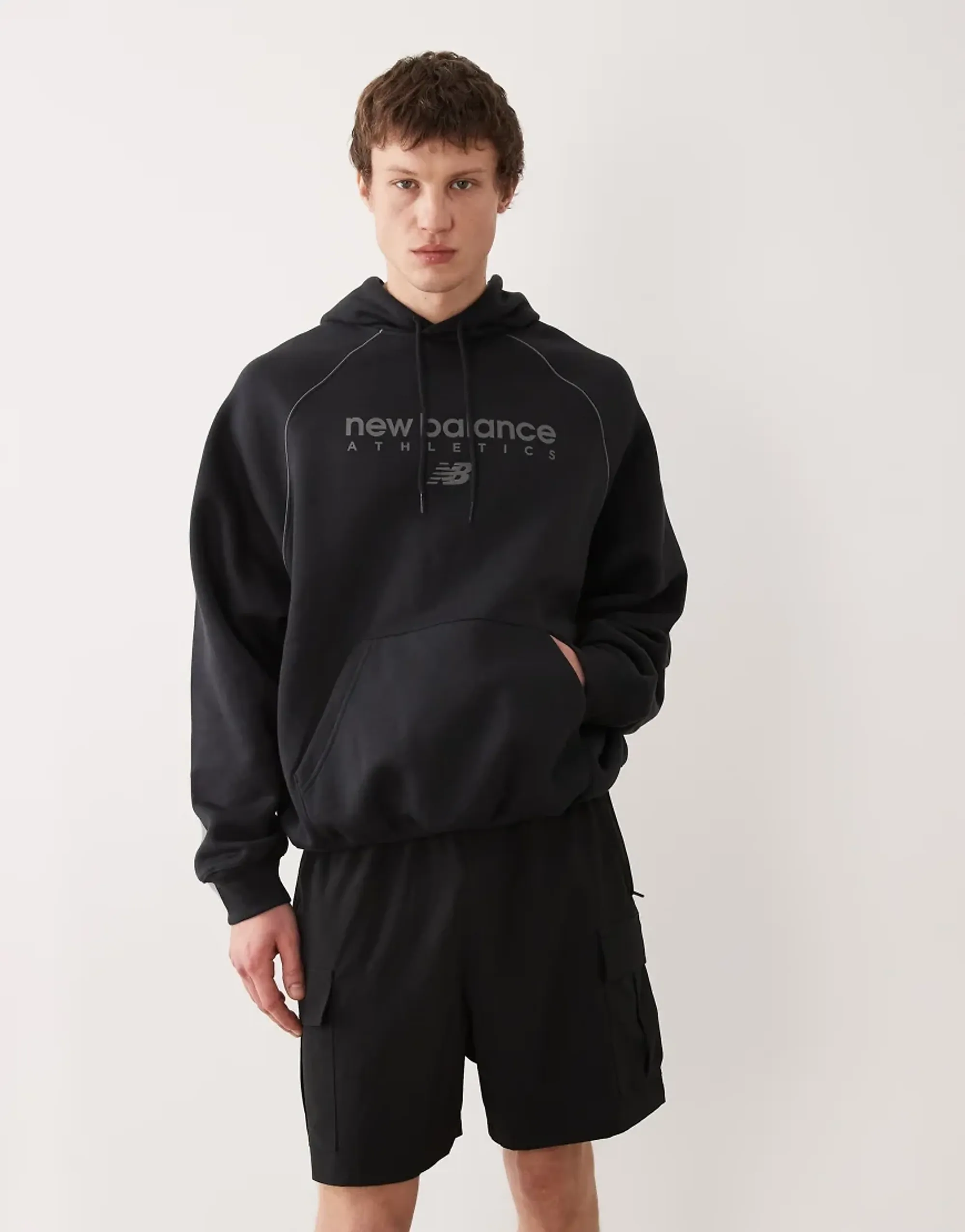 New Balance Men's Trackside Fleece Hoodie in Black/Grey Poly Fleece