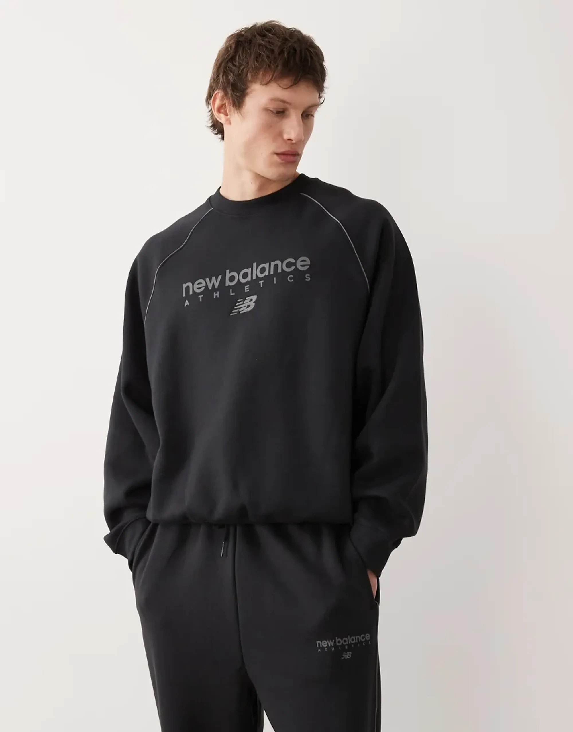New Balance Men's Trackside Fleece Crew in Black/Grey Poly Fleece
