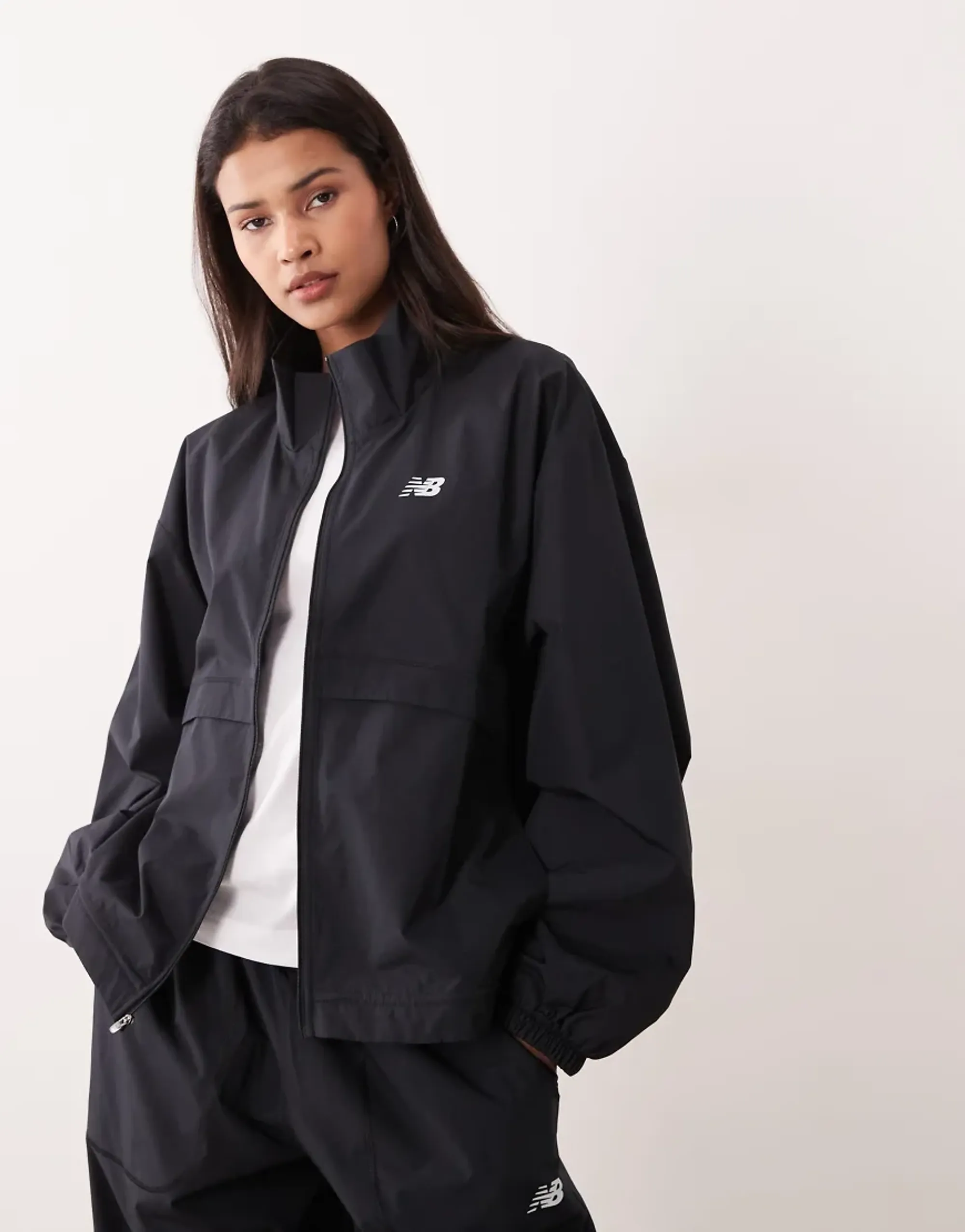New Balance Women Trackside Woven Jacket in Black Polywoven