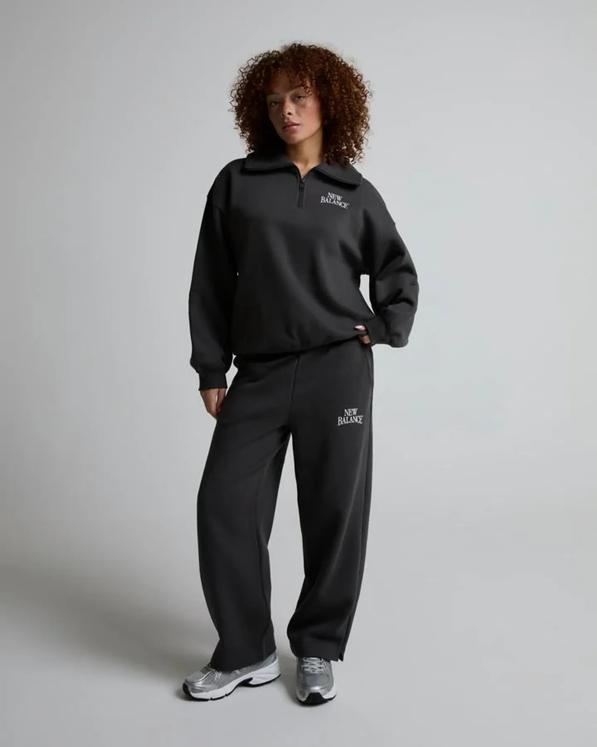 New Balance Women Trackside Fleece Half Zip in Black Cotton Fleece