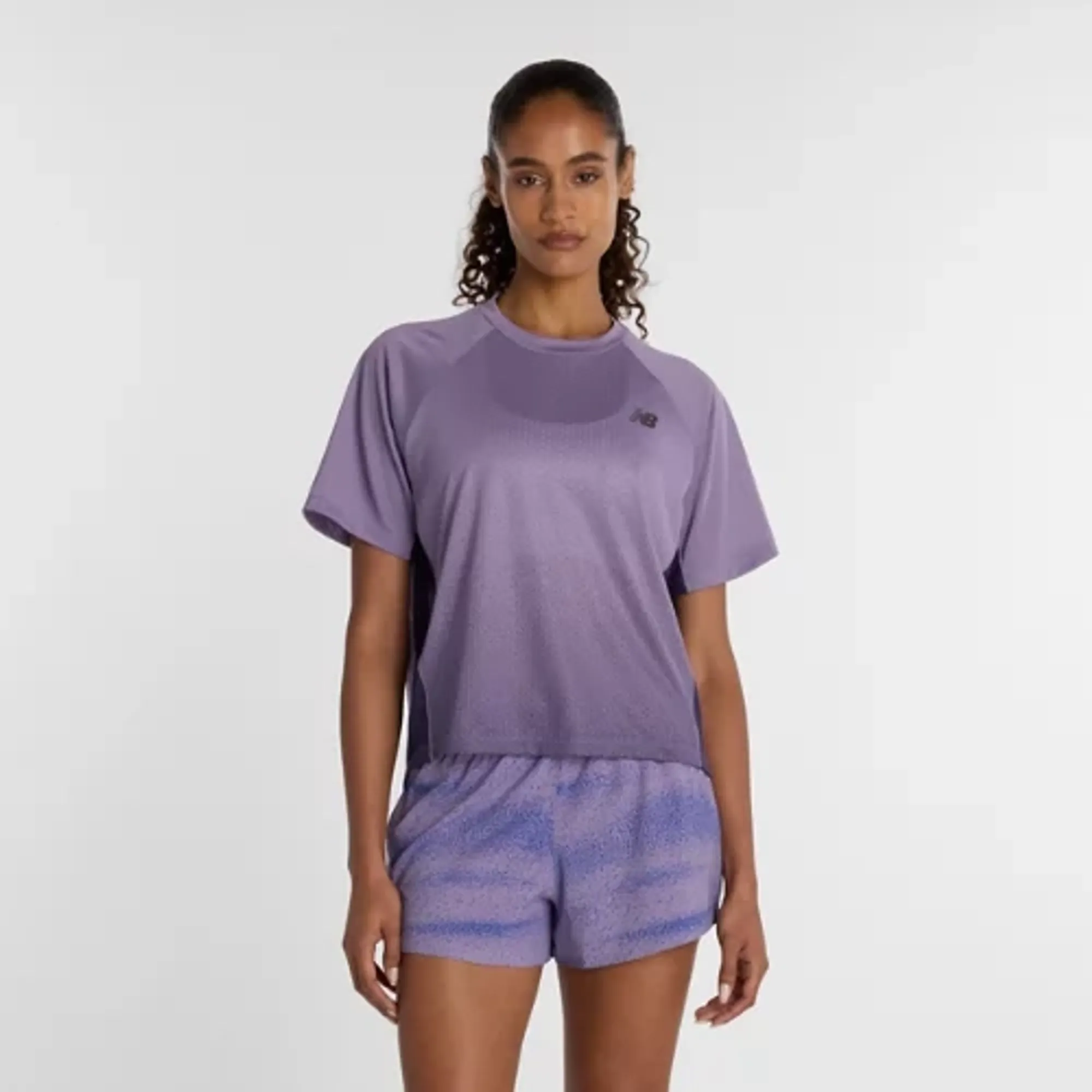 New Balance Women Viz-Tech Run T-Shirt in Purple Poly Knit