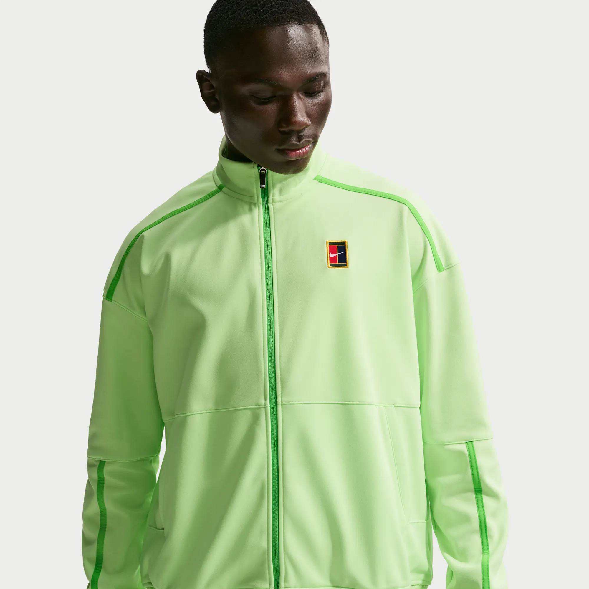 NikeCourt Heritage Men's Tennis Jacket - Green - Polyester