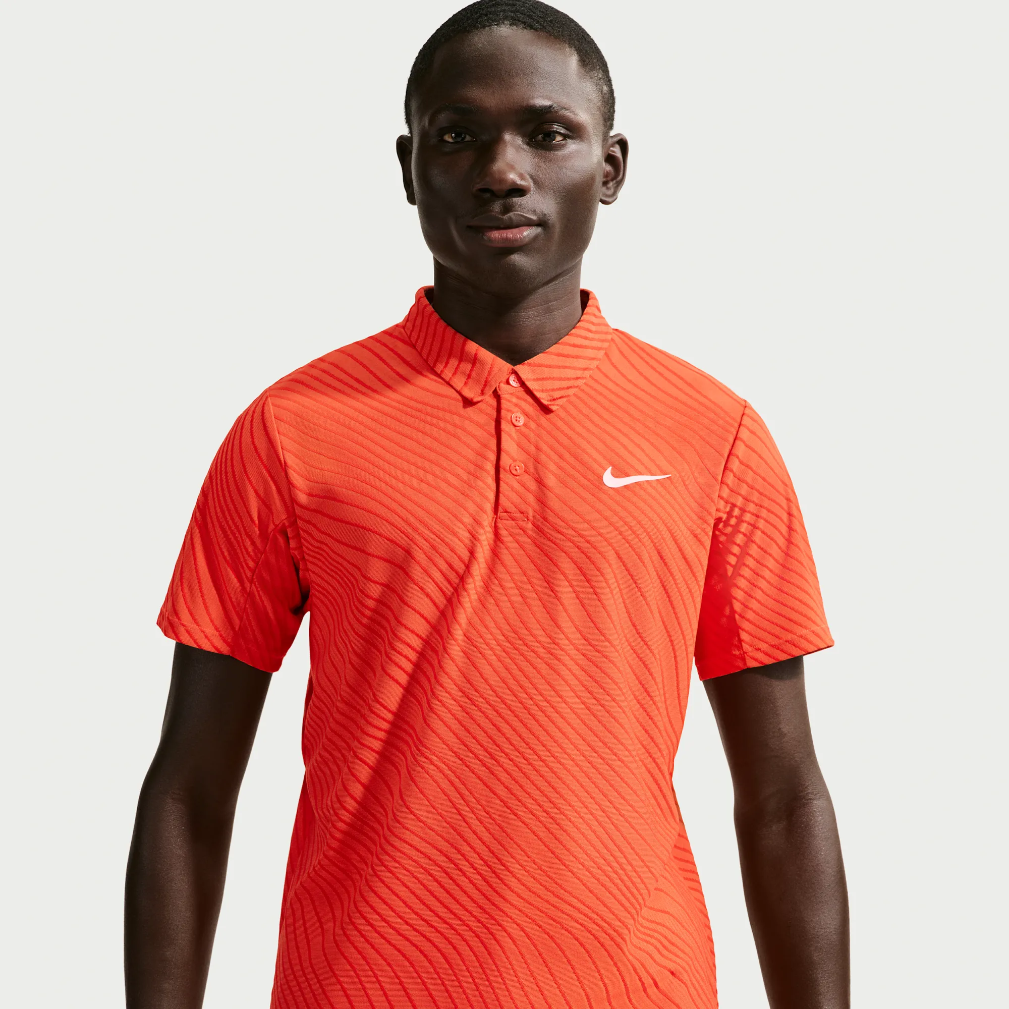 NikeCourt Men's Slam Dri-FIT ADV Polo - Orange - Polyester