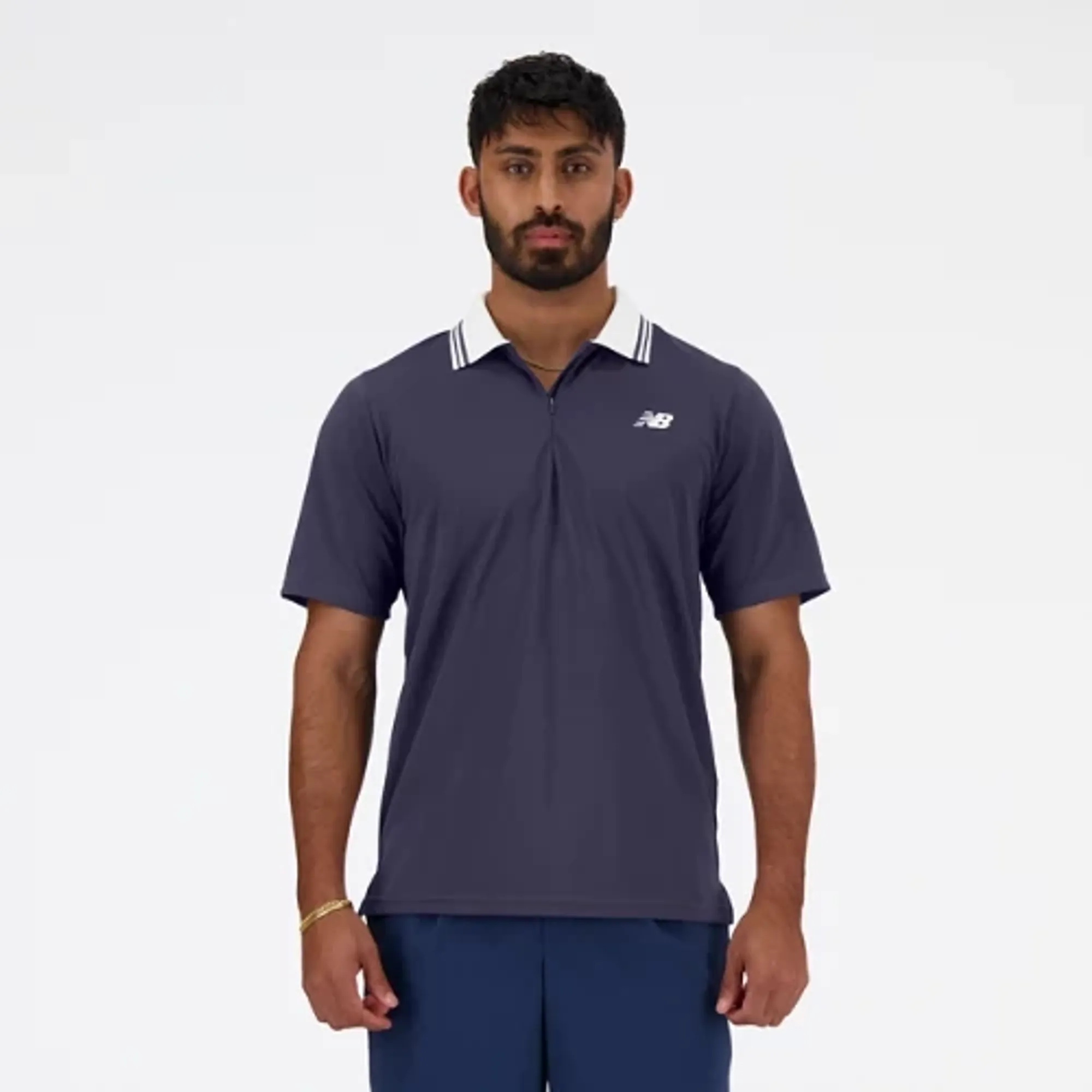 New Balance Men's Tournament Polo in Purple Poly Knit