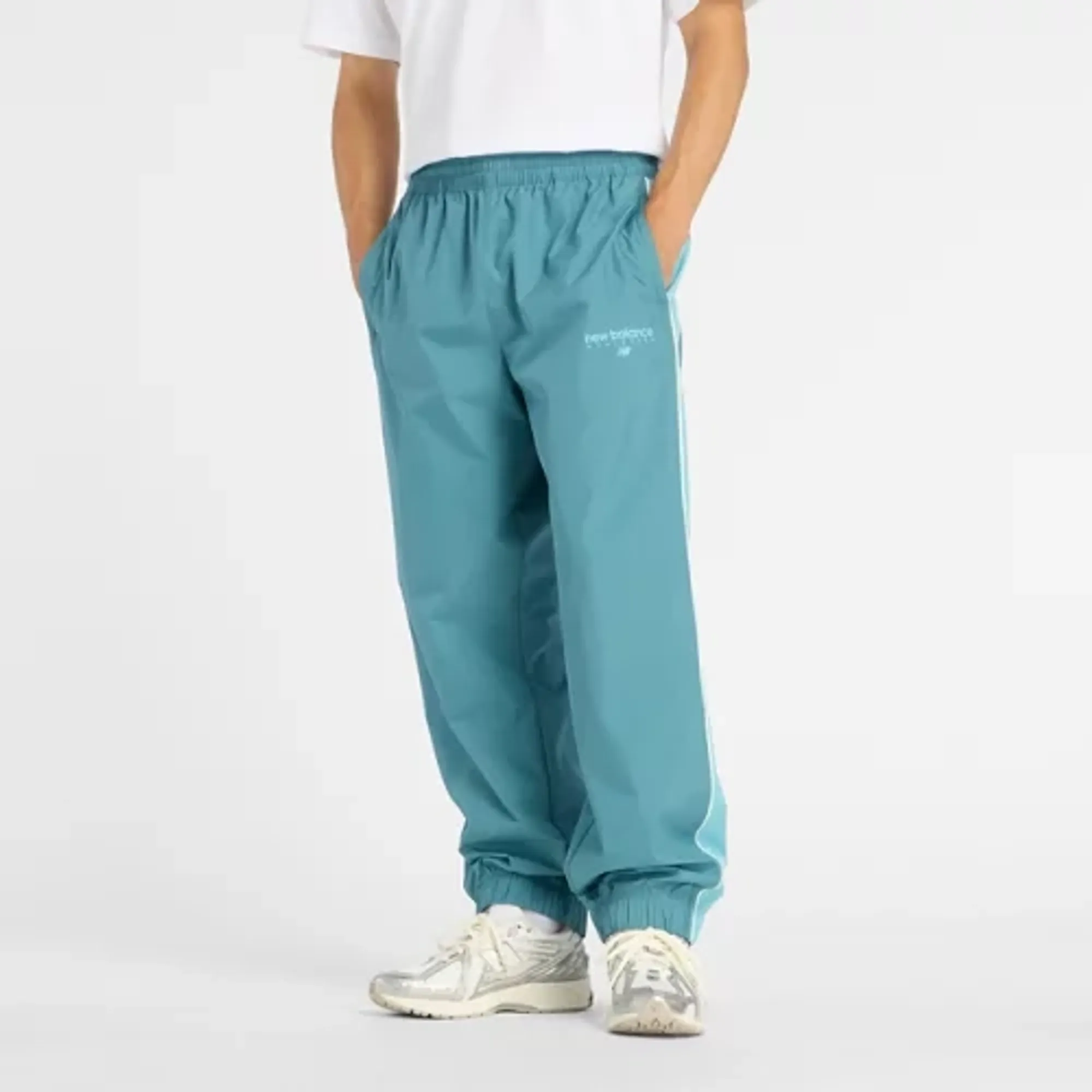 New Balance Men's Trackside Woven Pant in Blue/White Polywoven
