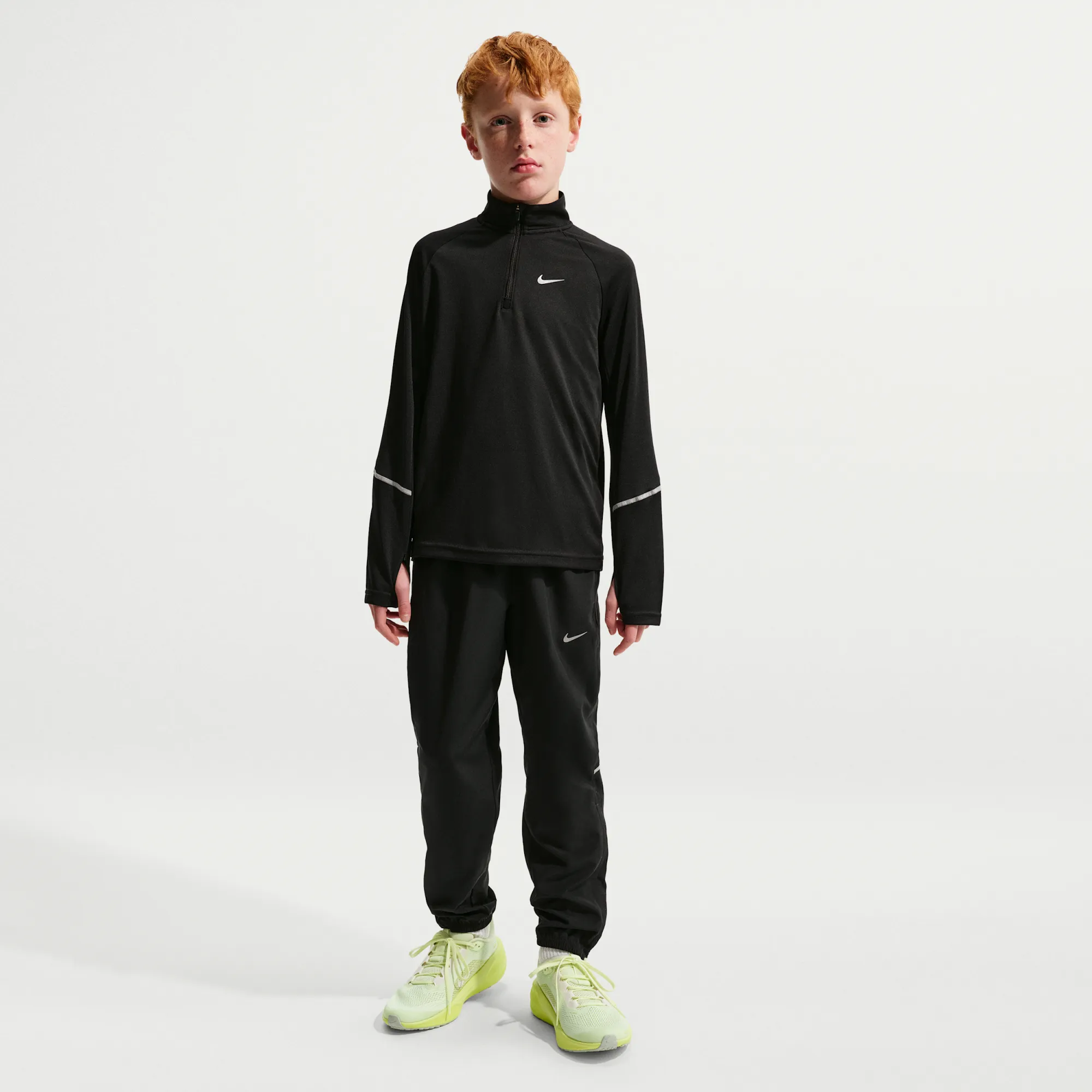 Nike Miler Older Kids' Dri-FIT Woven Trousers - Black