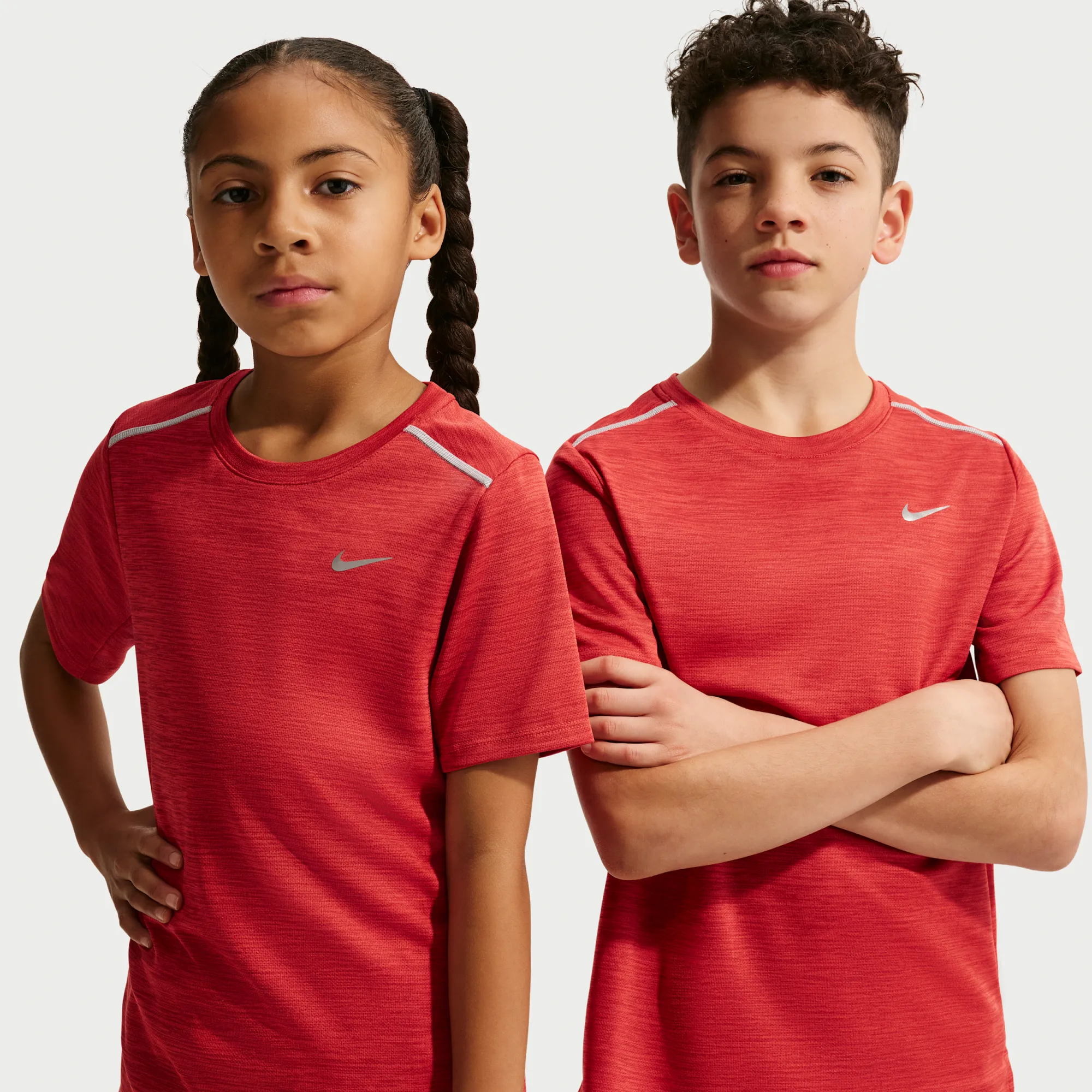 Nike Miler Older Kids' Dri-FIT Short-Sleeve Top - Light Crimson