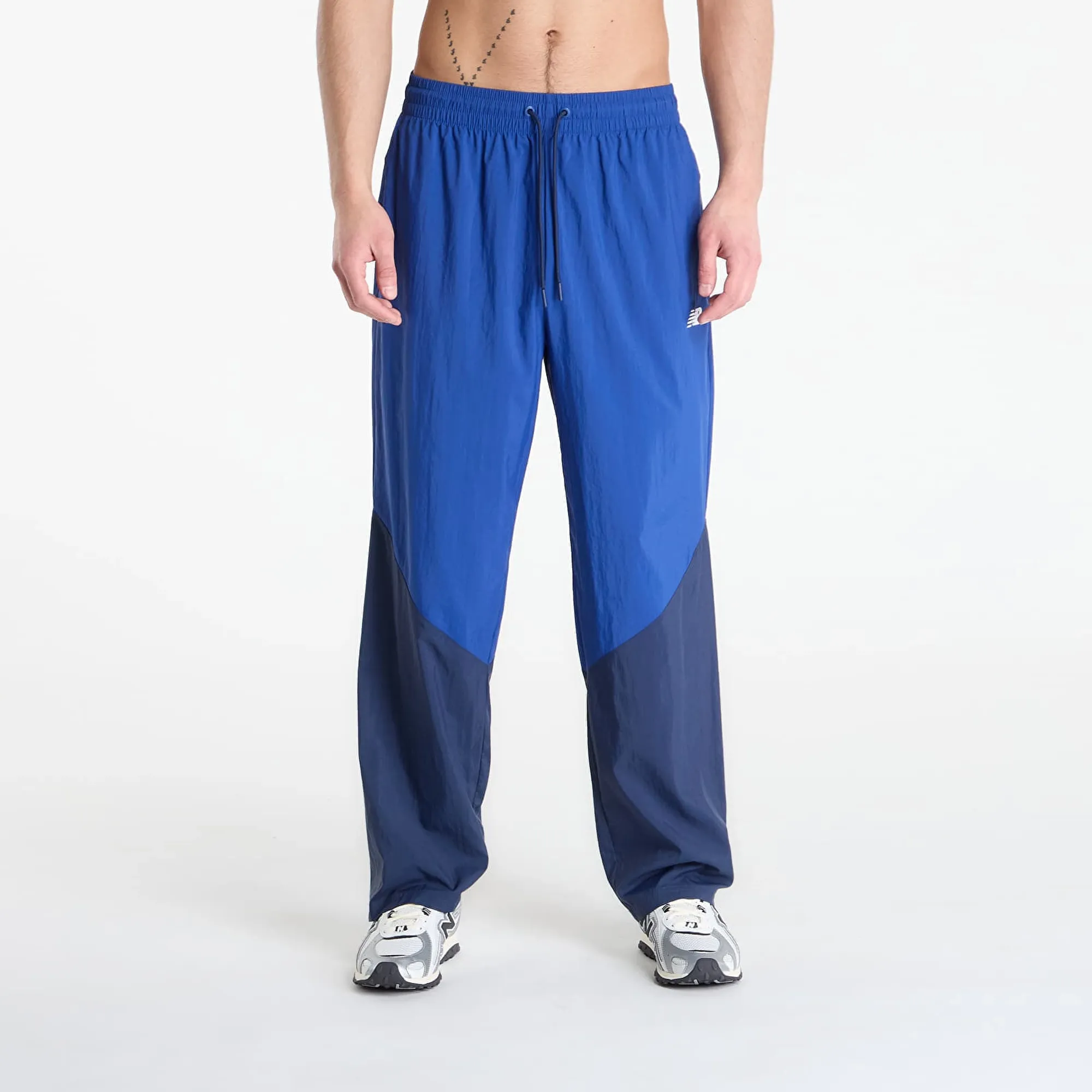 New Balance Men's Sport Legacy Pant in Blue Nylon