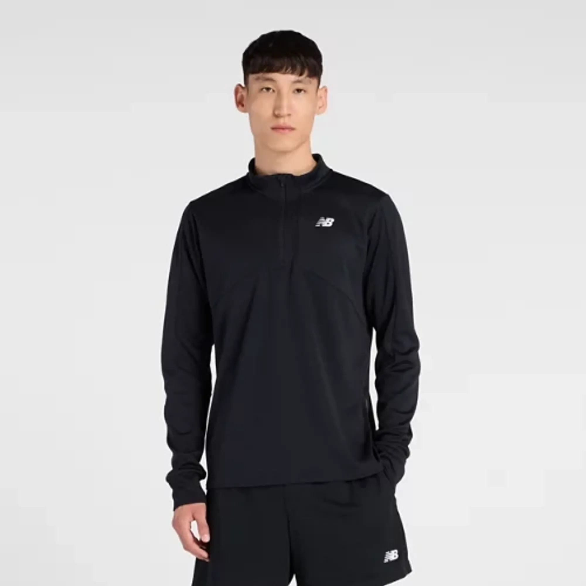 New Balance Men's Utility Knit 1/4 Zip in Black/White Poly Knit