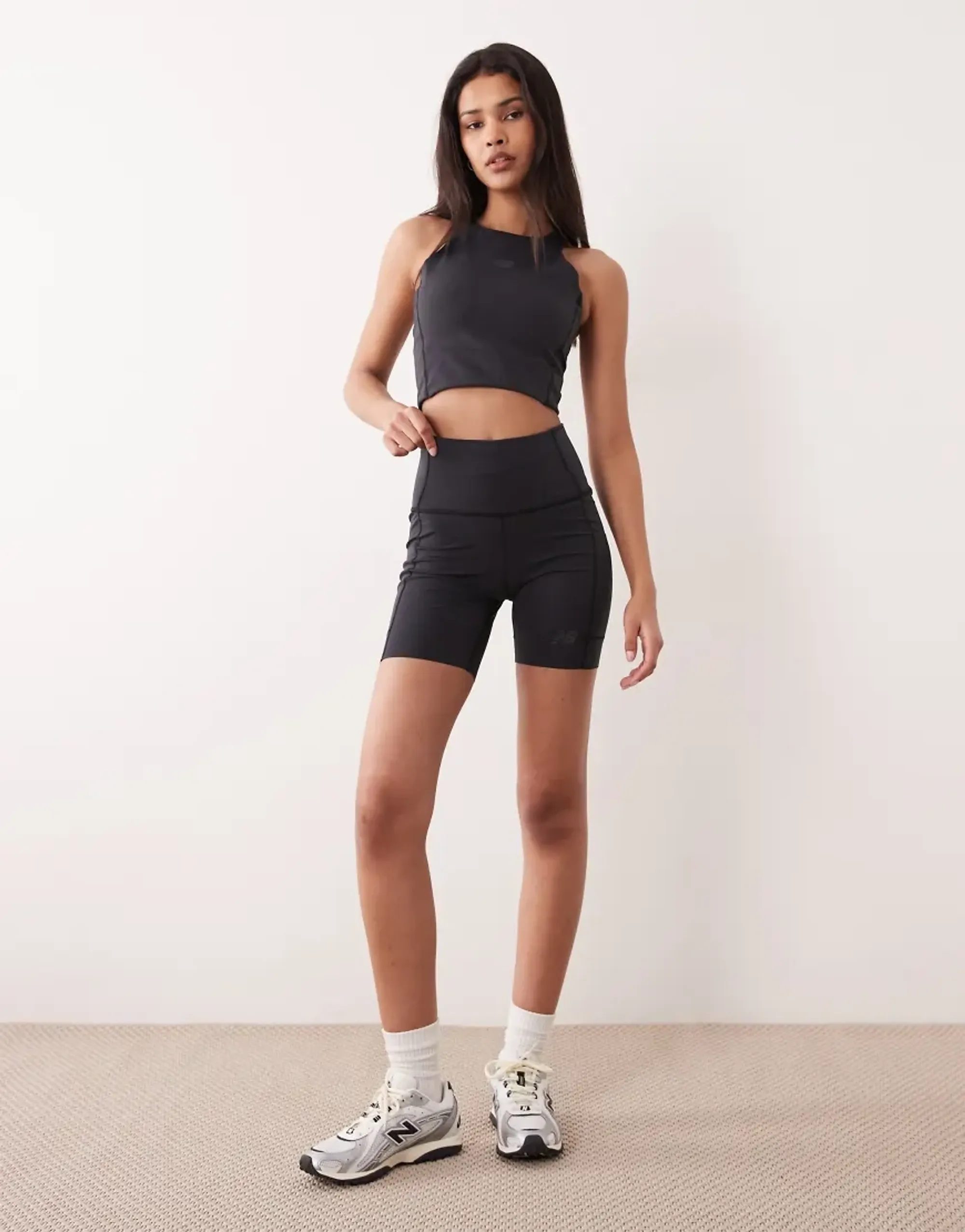 New Balance Women's RC Elite Storage Short 6" in Black Poly Knit