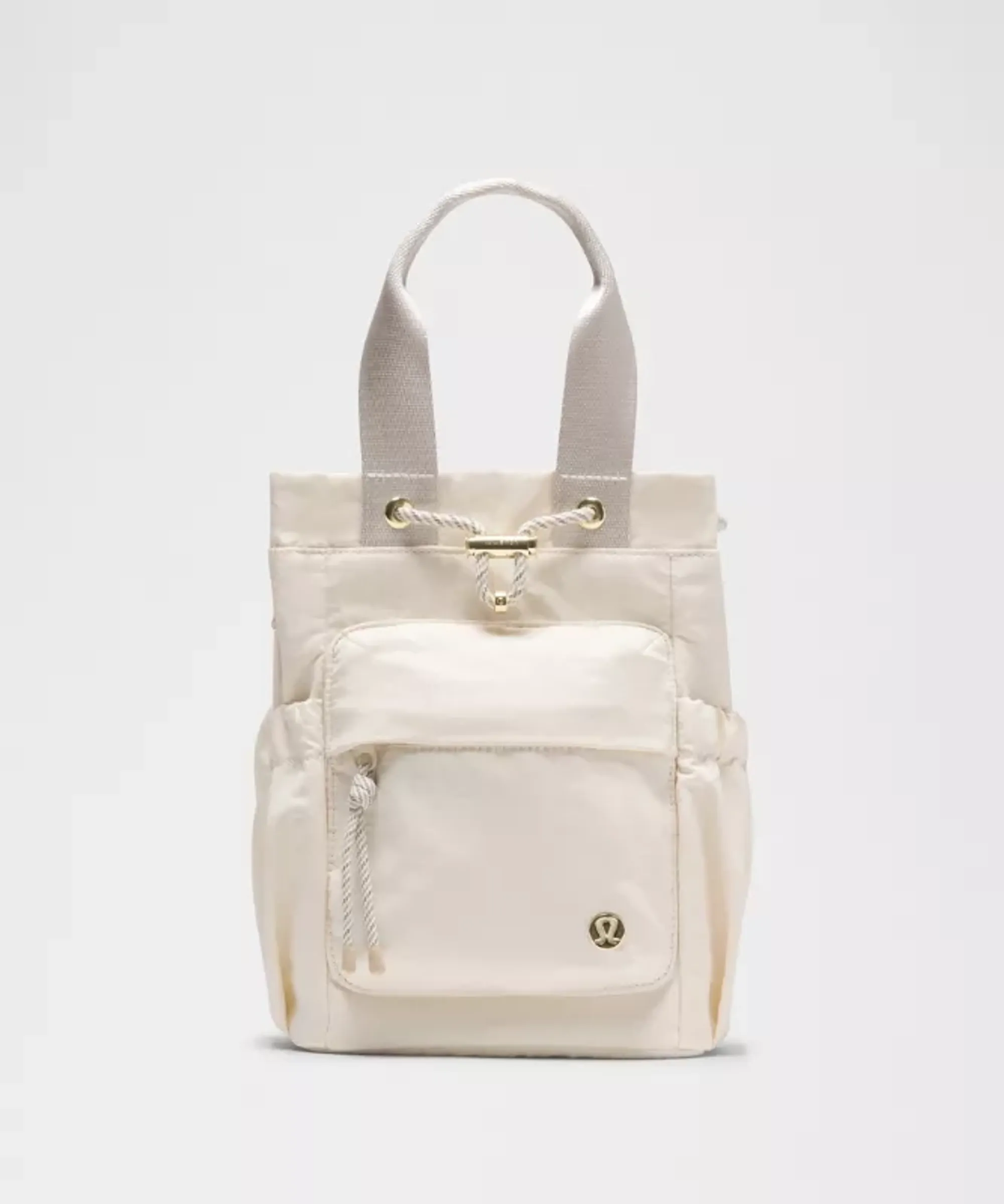 lululemon – Convertible Drawstring Bucket Bag Mini 5L – Color Khaki/Gold/White