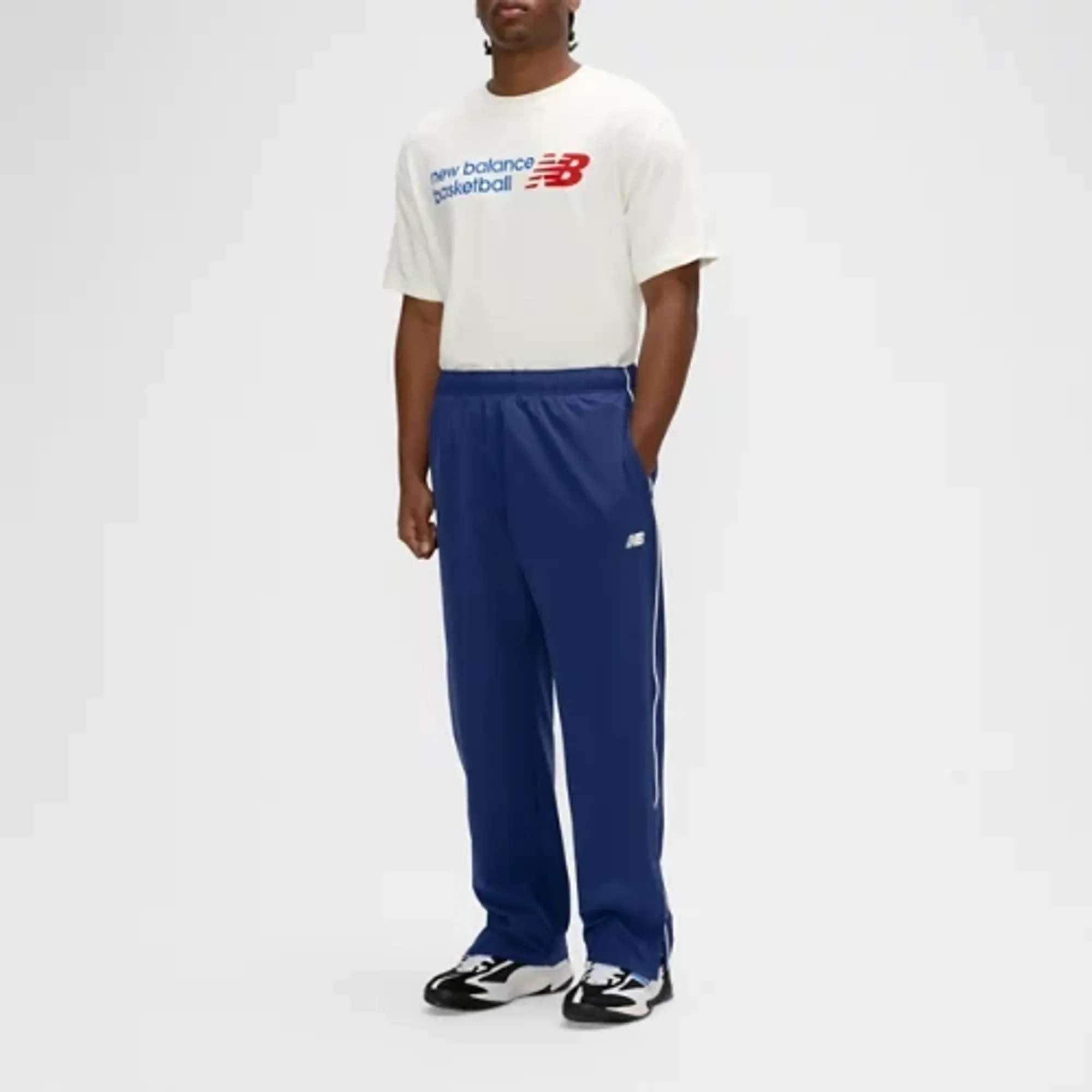 New Balance Men's Basketball Woven Pant in Blue Nylon Woven