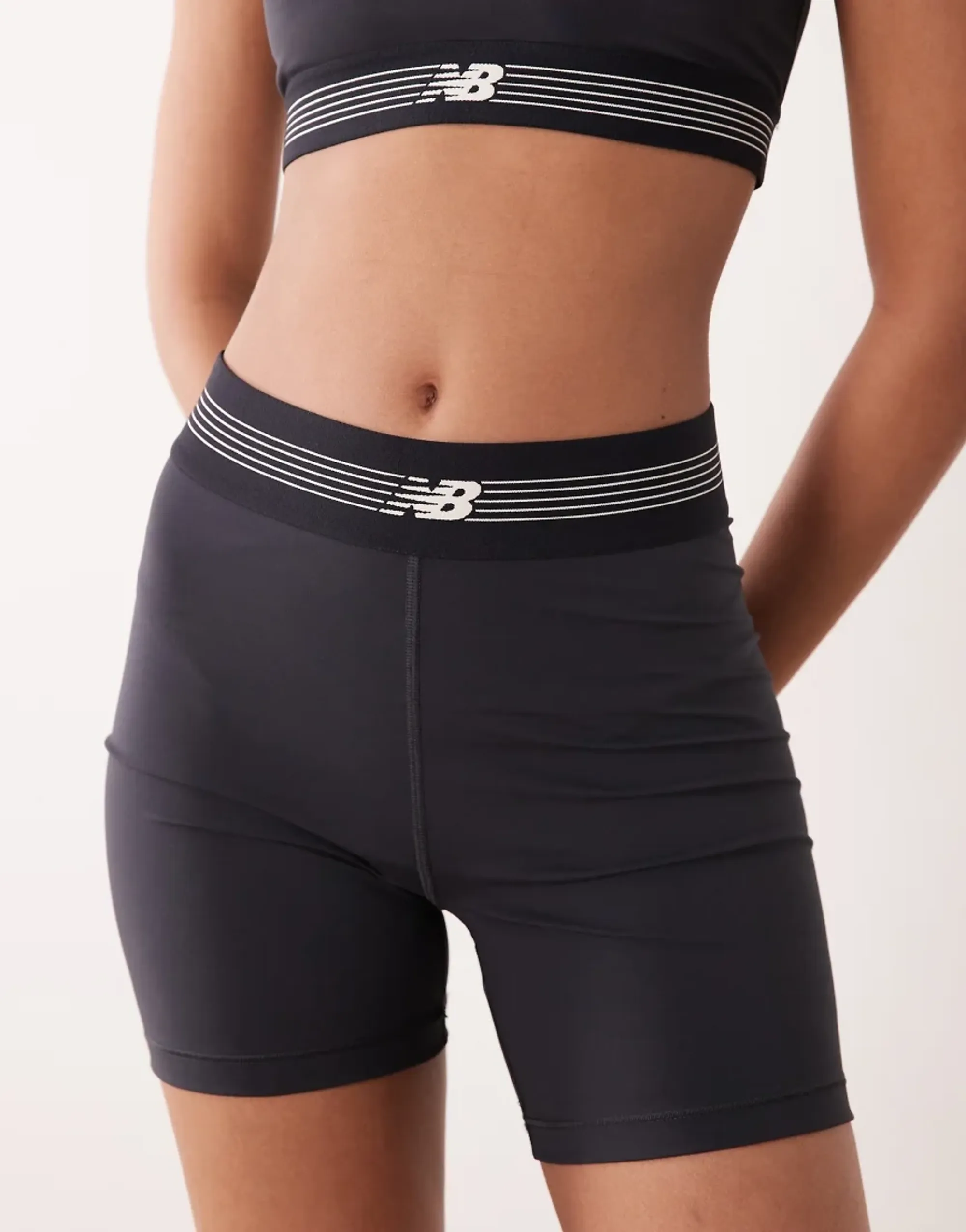 New Balance Women's AC Fitted Short 5 in Black Poly Knit