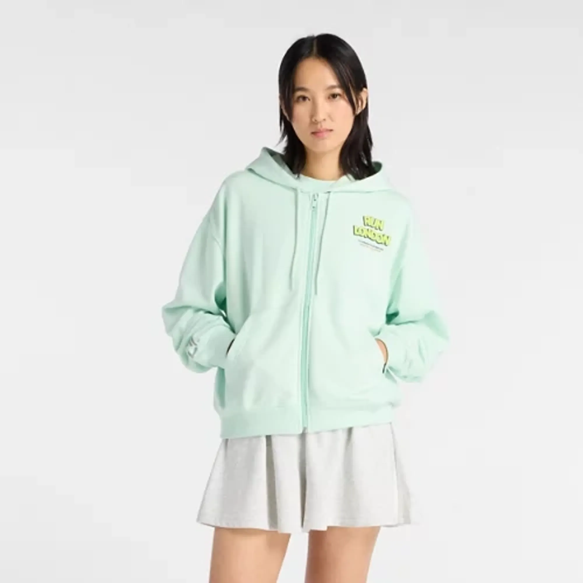 New Balance Women's London Edition Sport Essentials French Terry Full Zip in Green Cotton