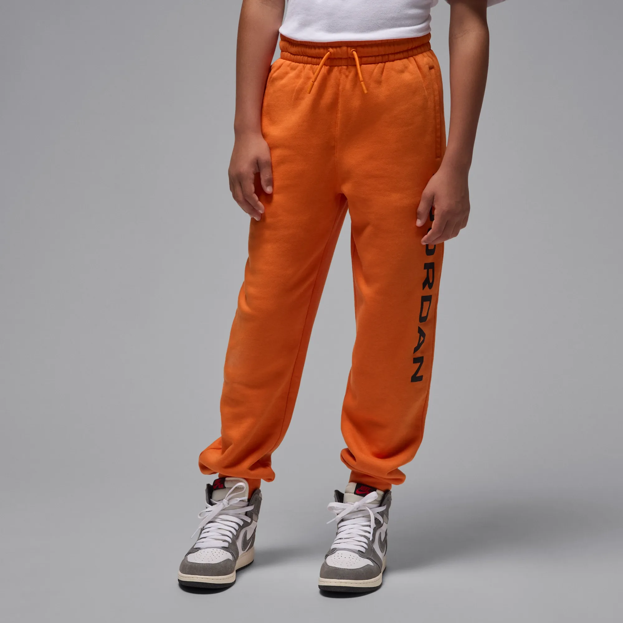Nike Jordan Essentials Older Kids' Fleece Baseline Trousers - Orange - Cotton