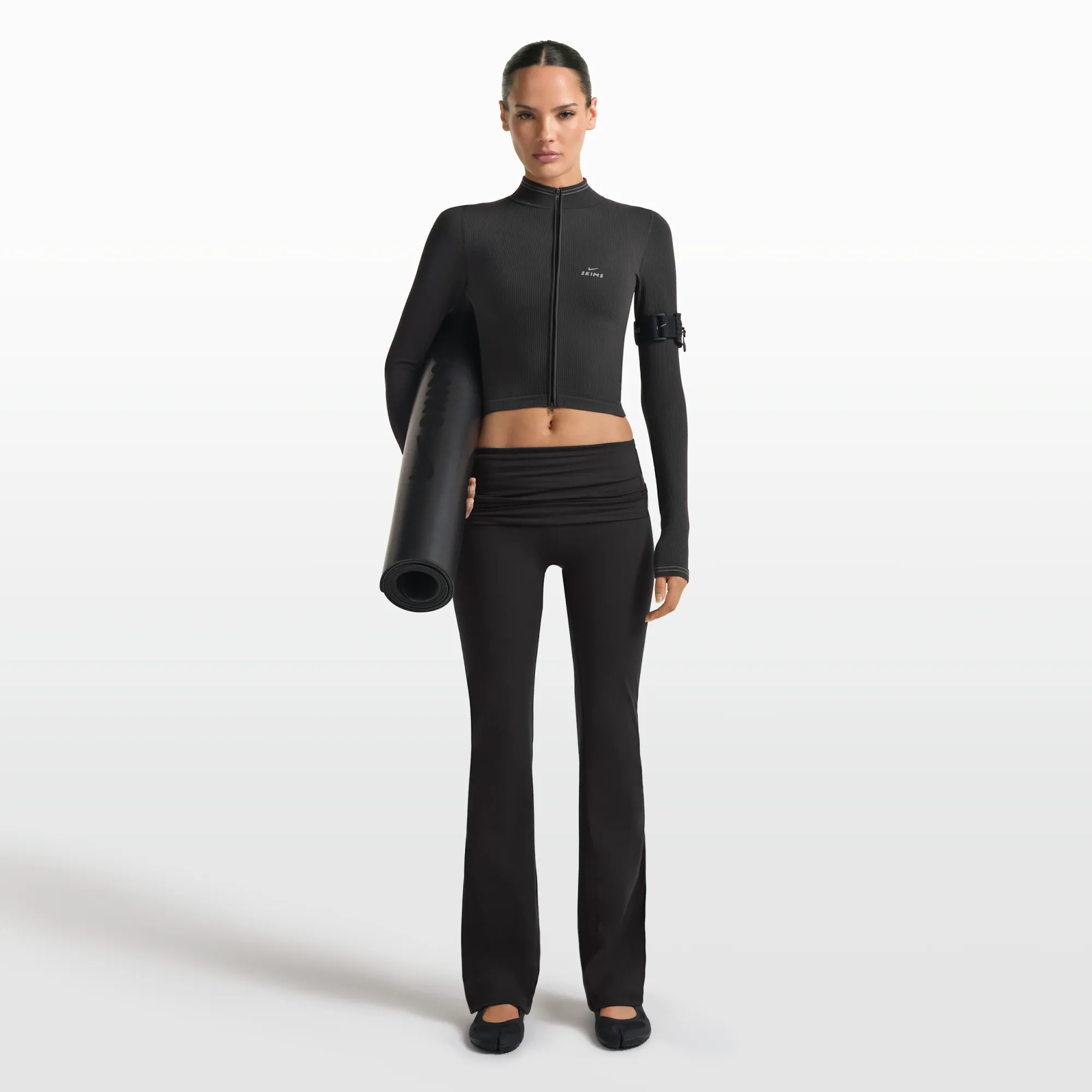 NikeSKIMS Matte Women's Flared Fold-Over Waistband Trousers - Black - Nylon/Elastane