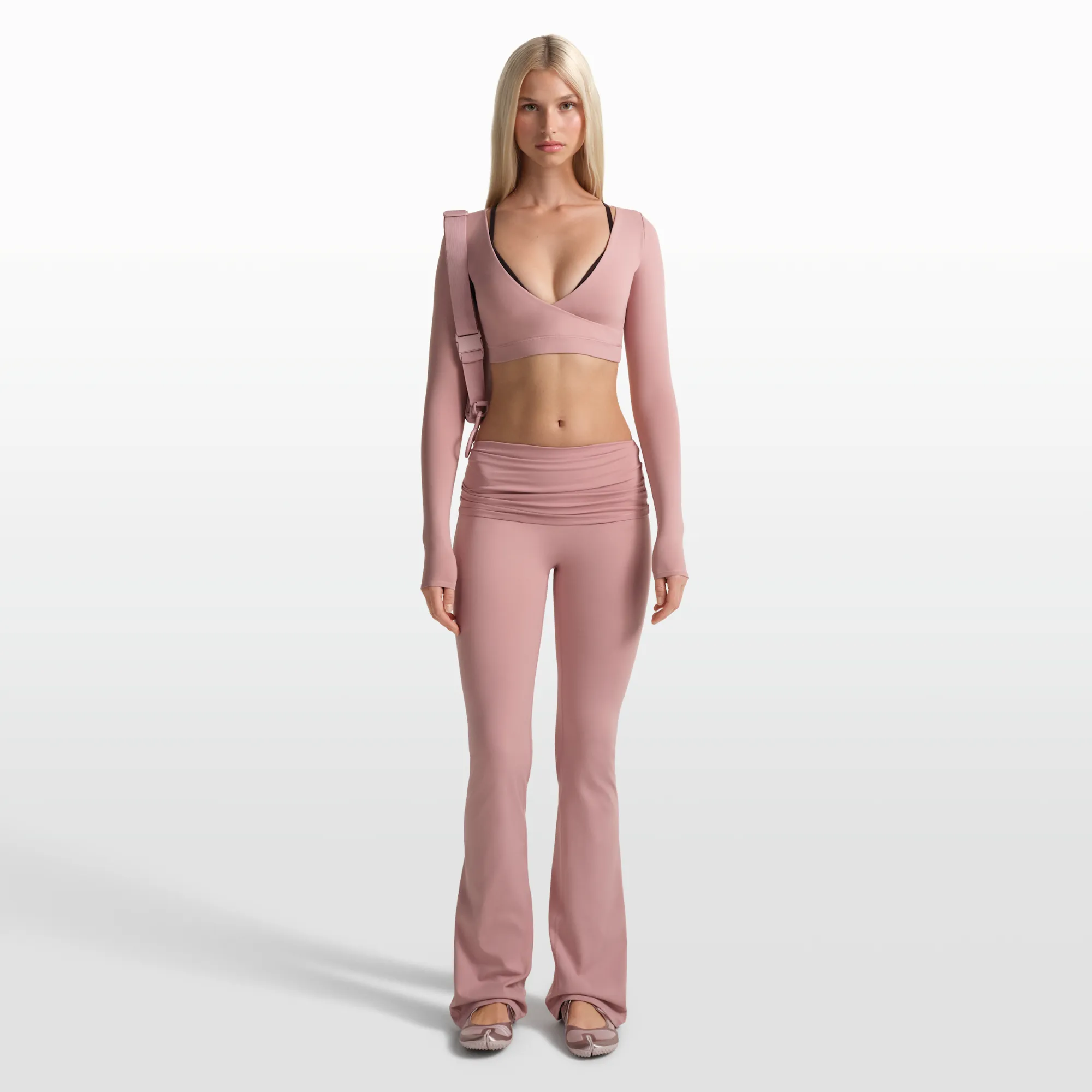 NikeSKIMS Matte Women's Flared Fold-Over Waistband Trousers - Pink - Nylon/Elastane