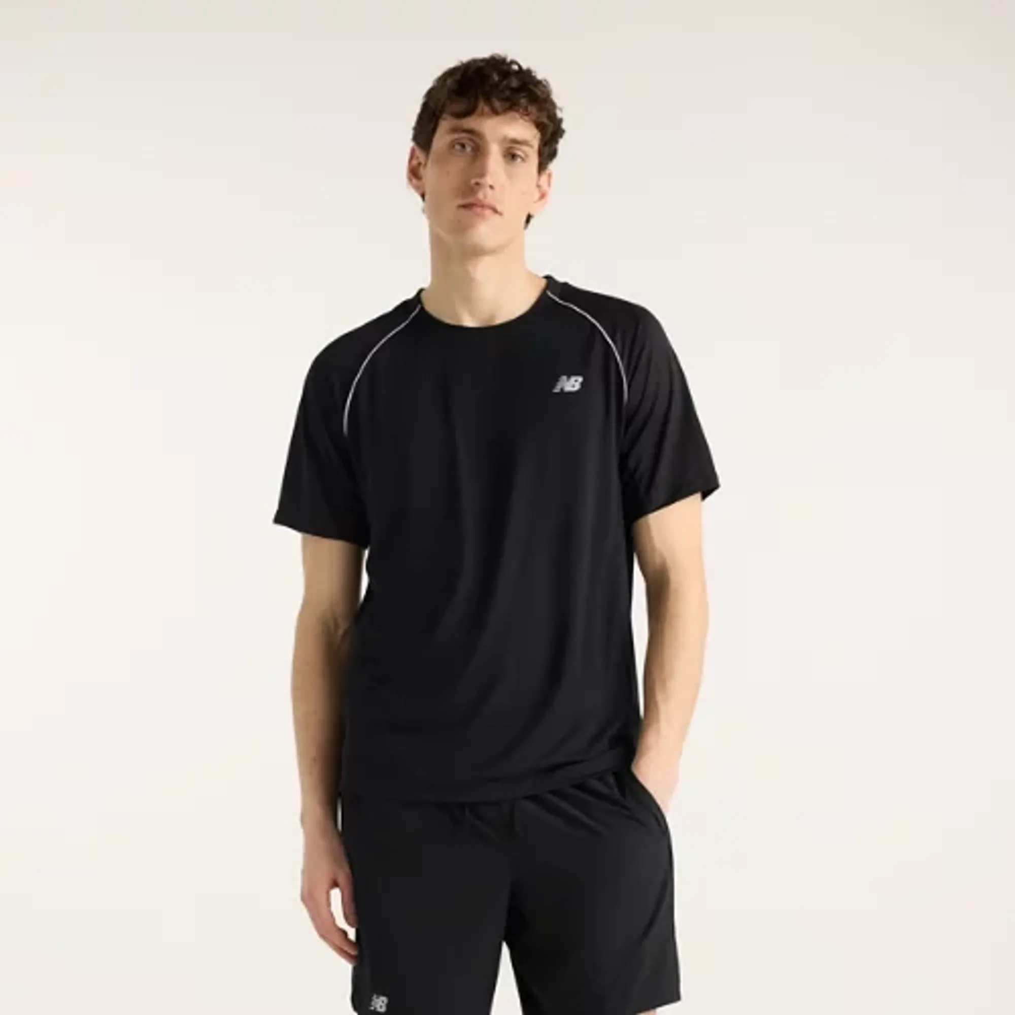 New Balance Men's Tournament Top in Black/White Poly Knit