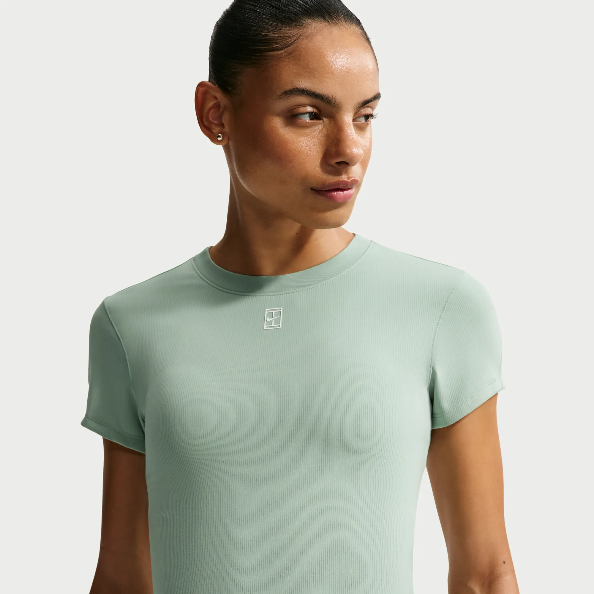 NikeCourt Advantage Women's Dri-FIT Short-Sleeve Tennis Top - Green - Polyester/Elastane