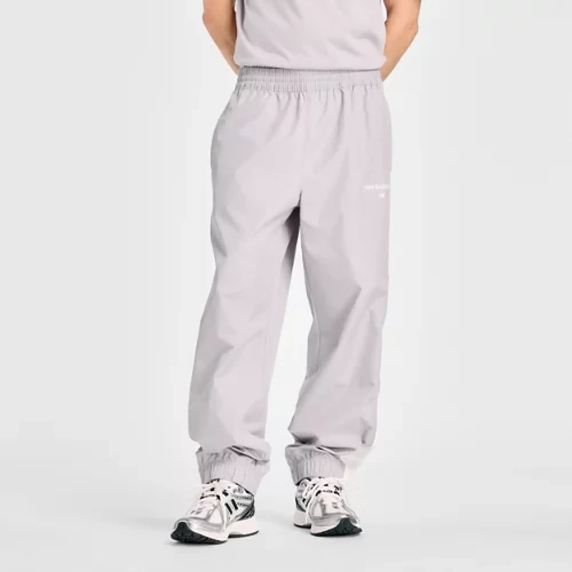 New Balance Men's Trackside Woven Pant in Grey/White Polywoven