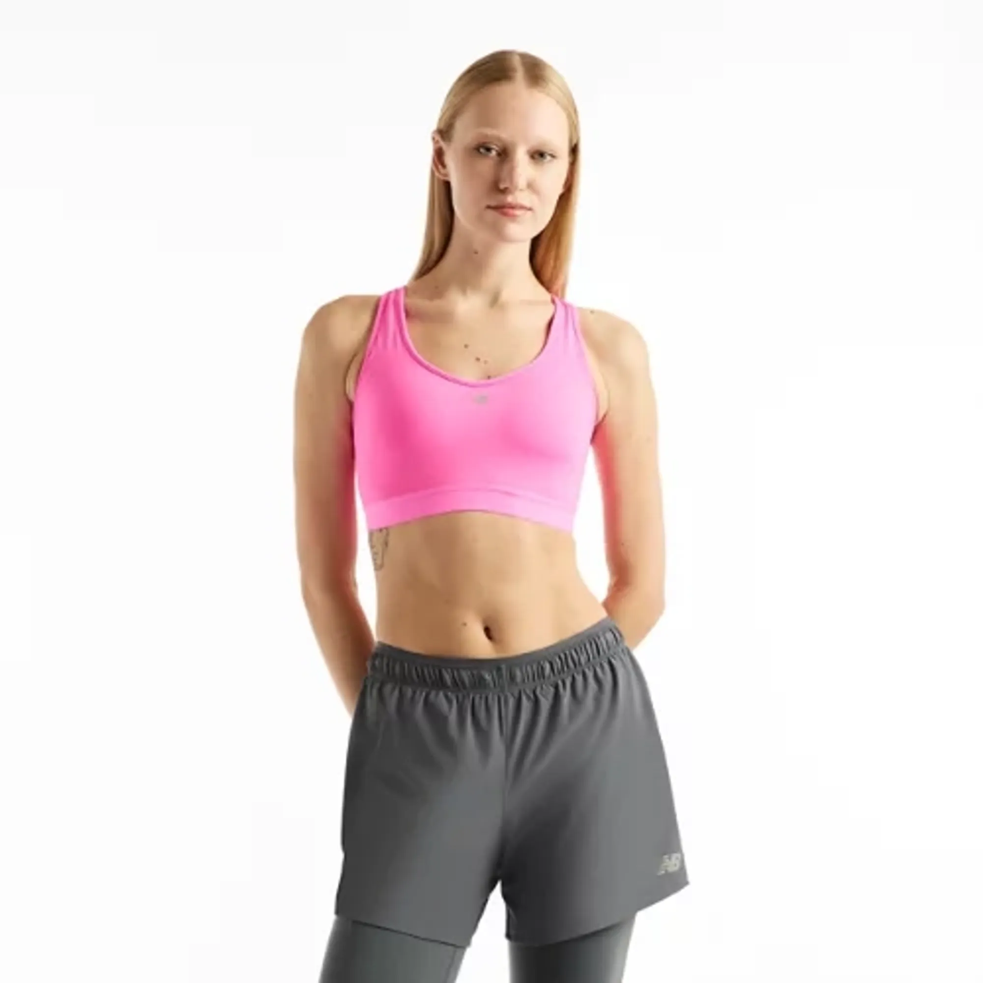 New Balance Women's NB Essential Run Bra in Pink Poly Knit