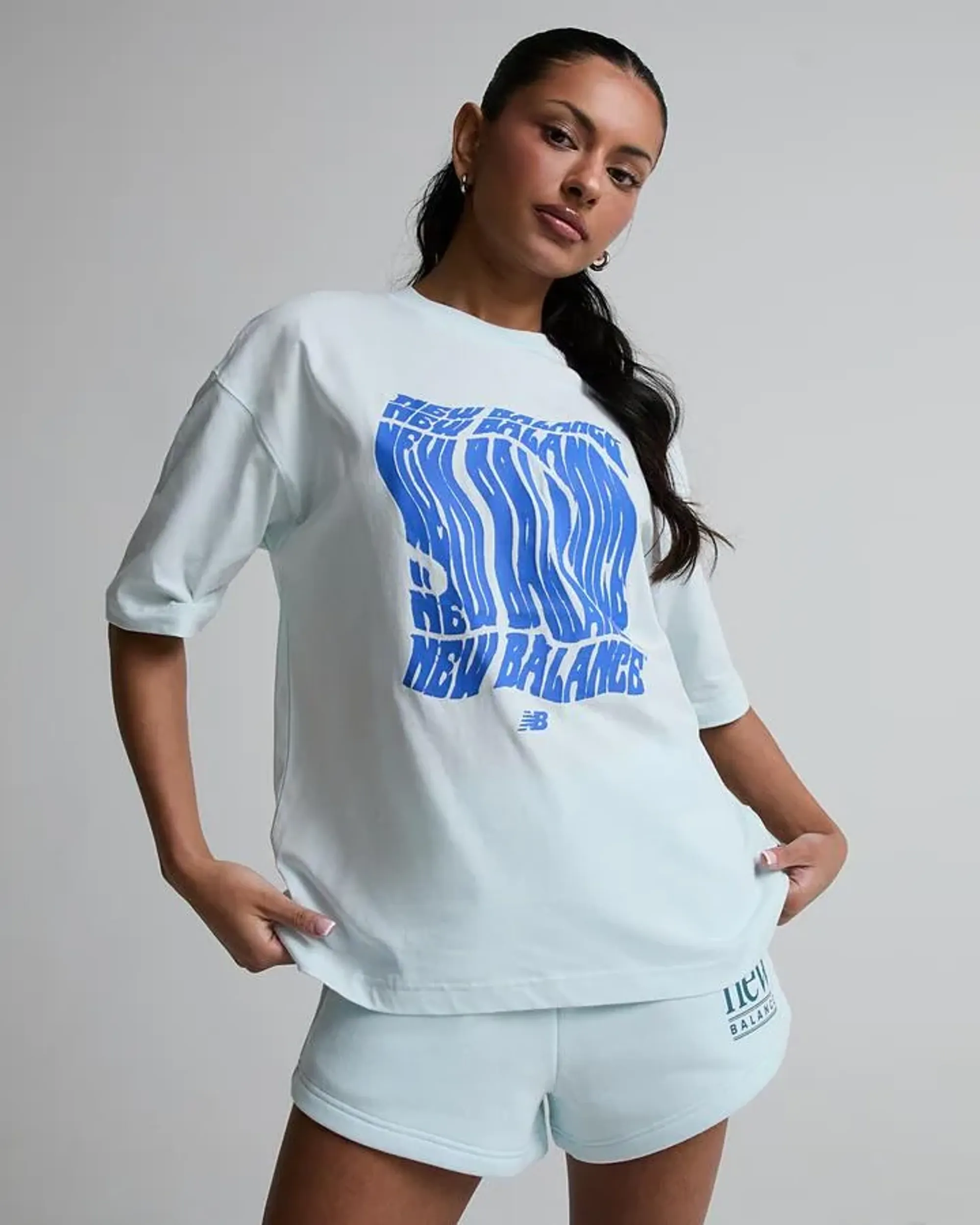 New Balance Women's Wavey Relaxed T-Shirt in Blue Cotton