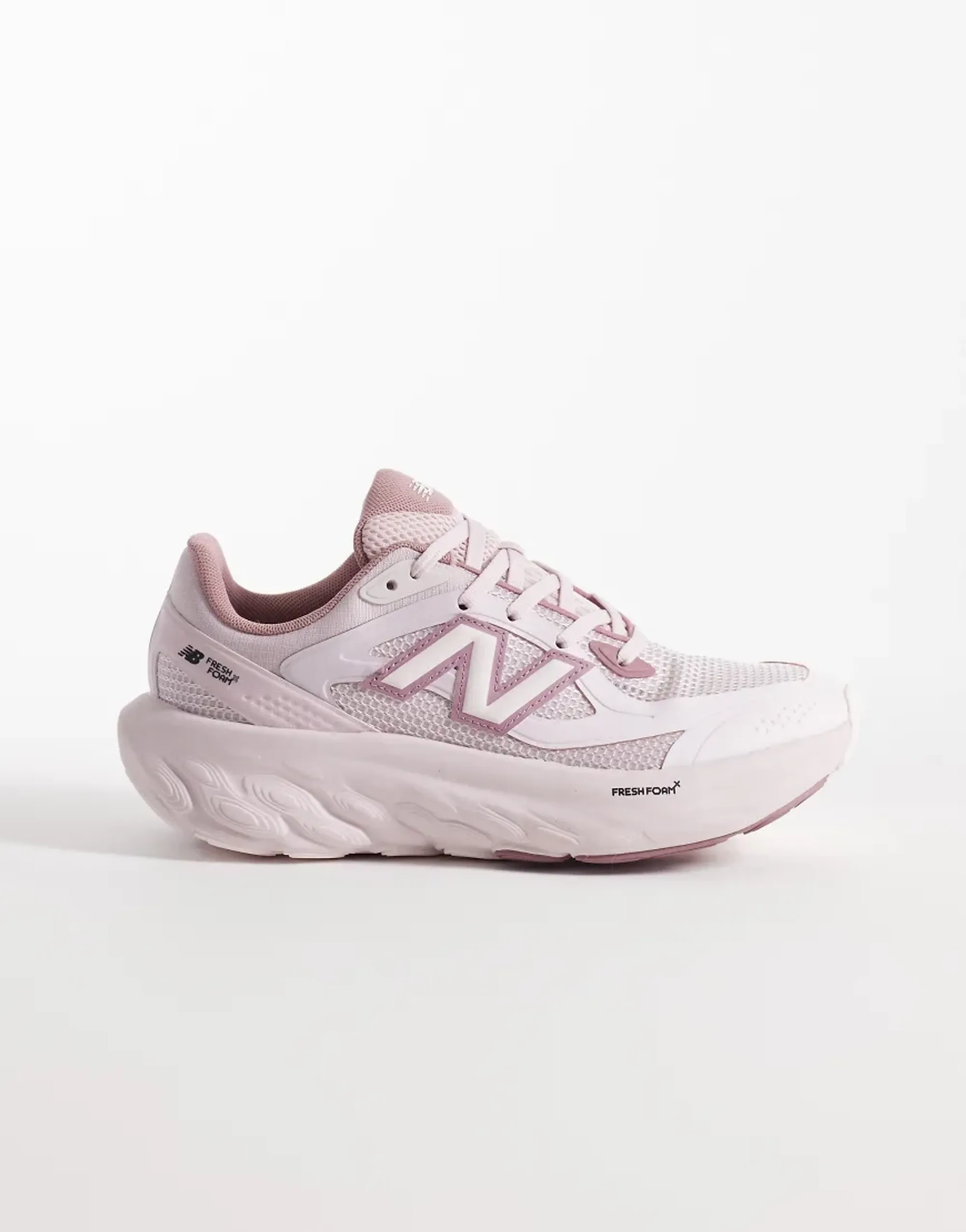 New Balance TRN Trainers in Pale Pink