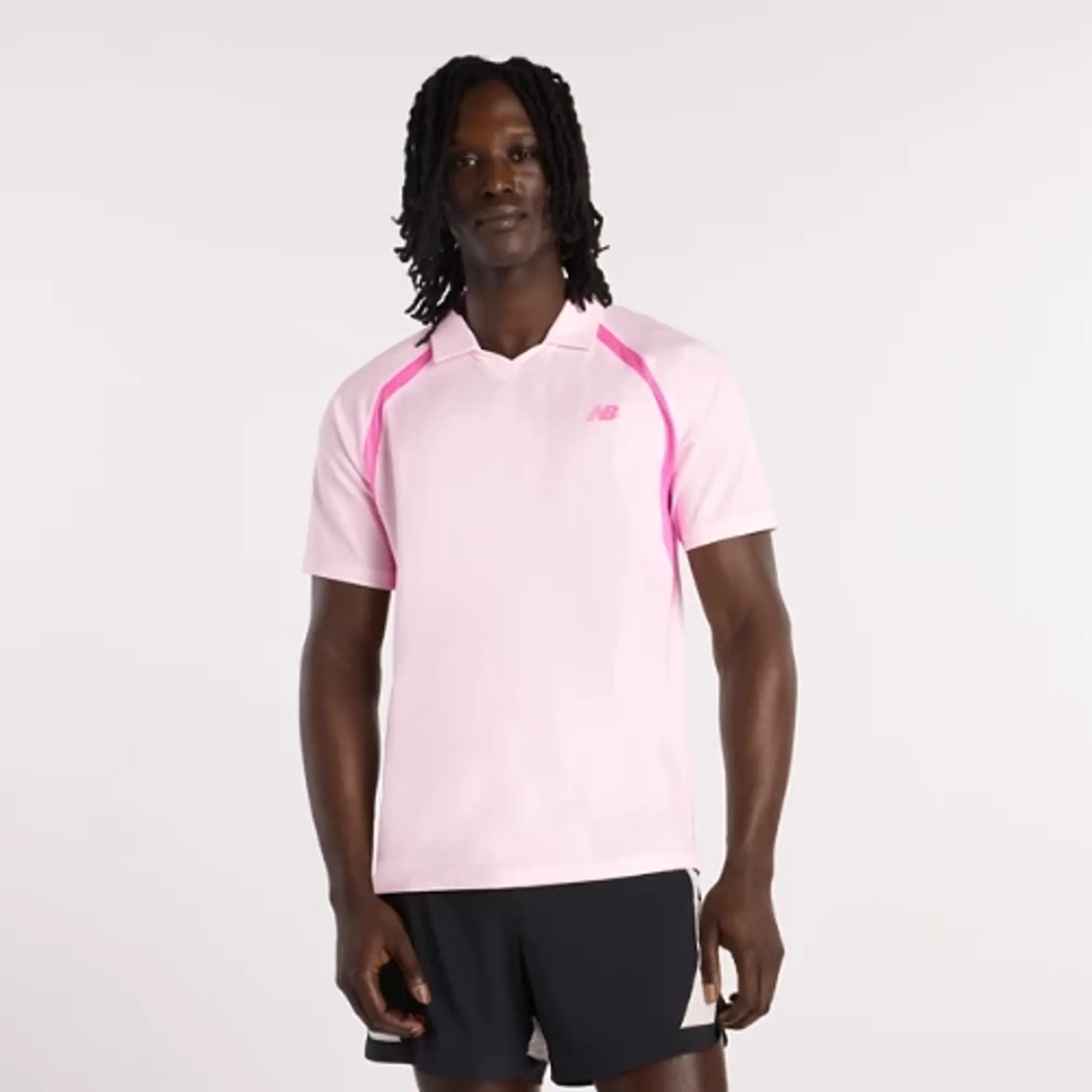 New Balance Men's Tournament Polo in Pink Poly Knit