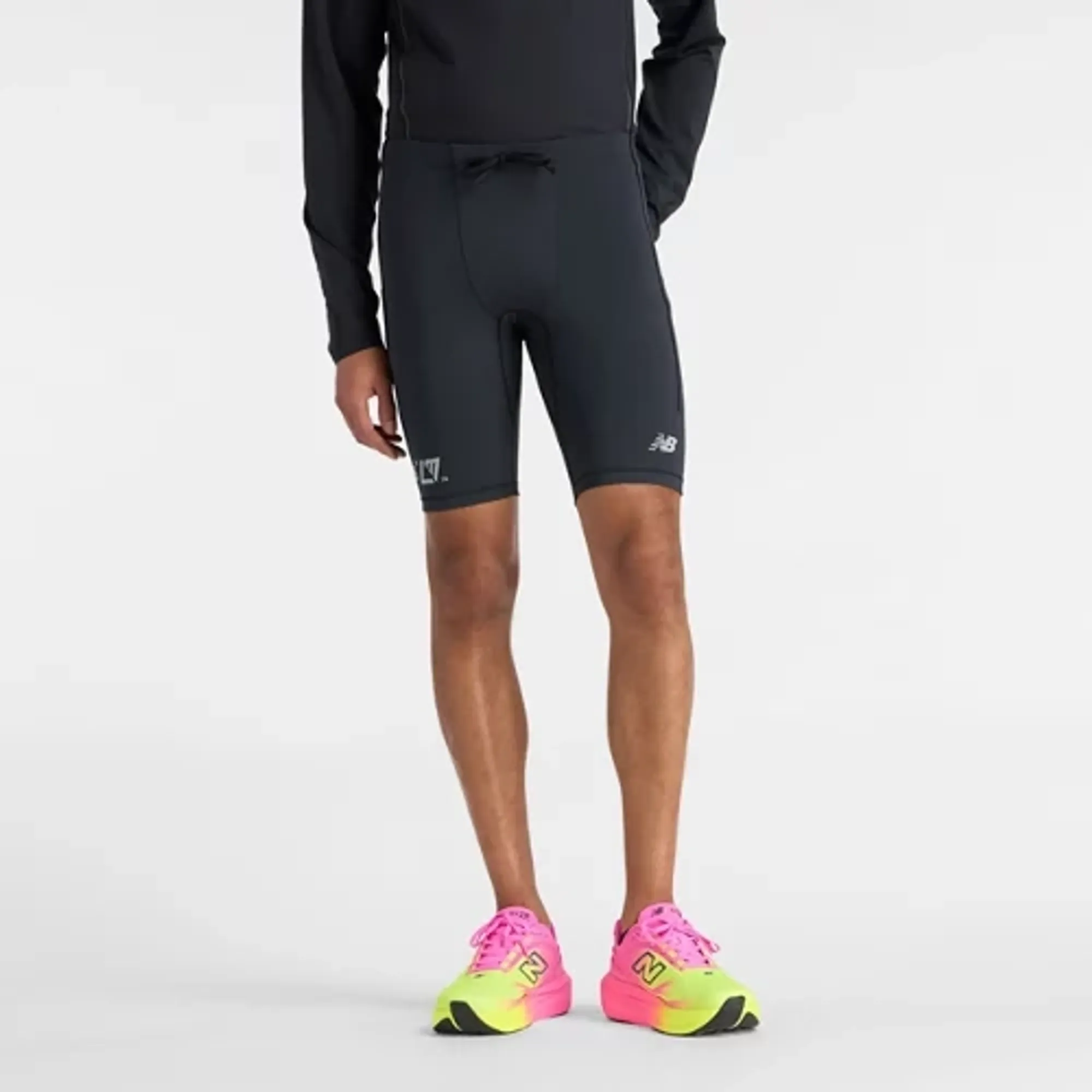 New Balance Men's London Edition NB Sleek Pocket Half Tight 9" in Black Polyester