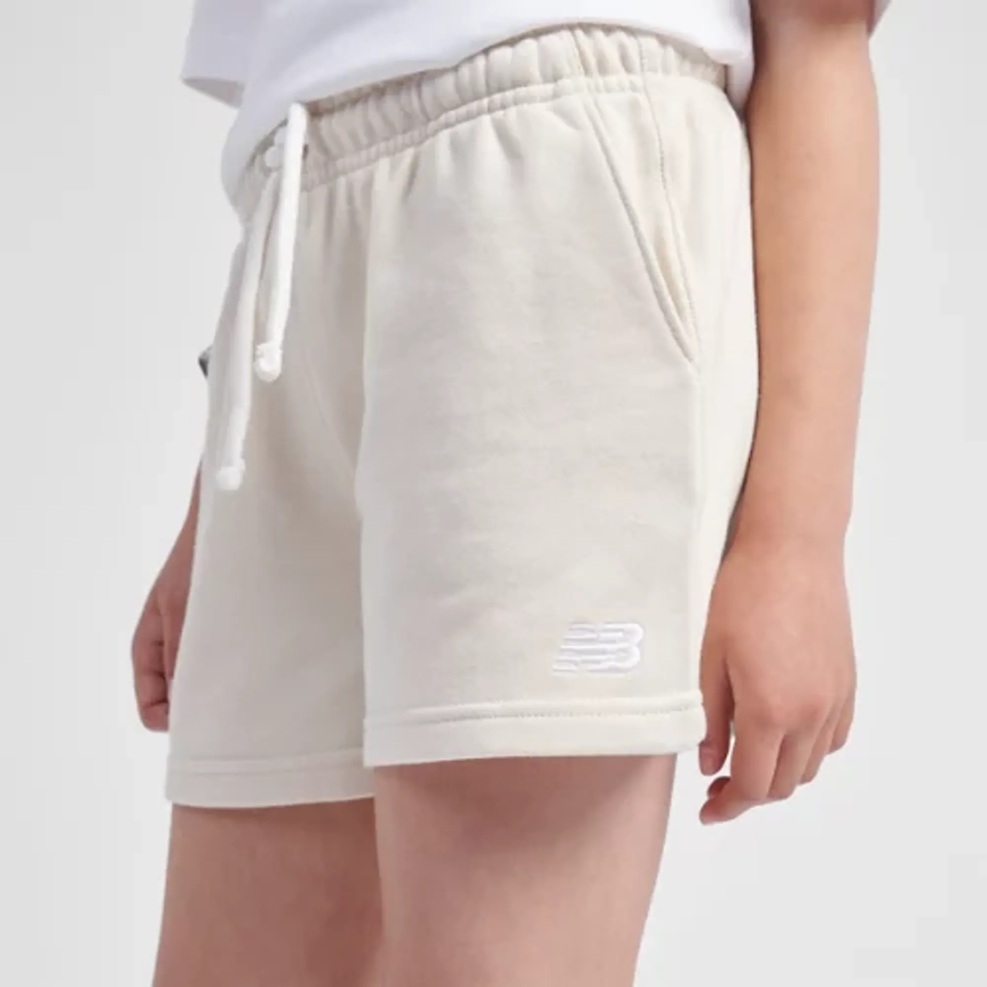 New Balance Girls FT Small Logo Short in Beige Cotton Fleece