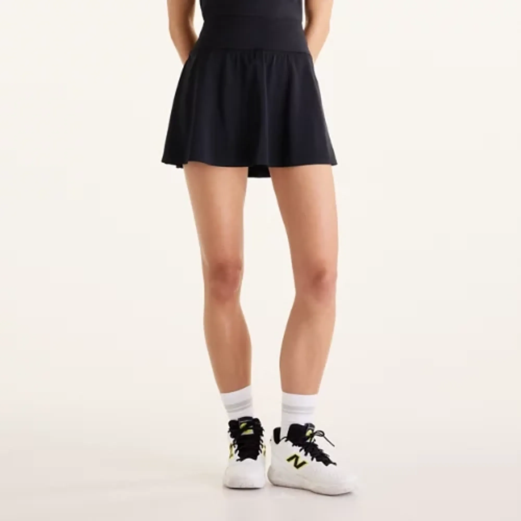 New Balance Women's Tournament Skort in Black/White Poly Knit