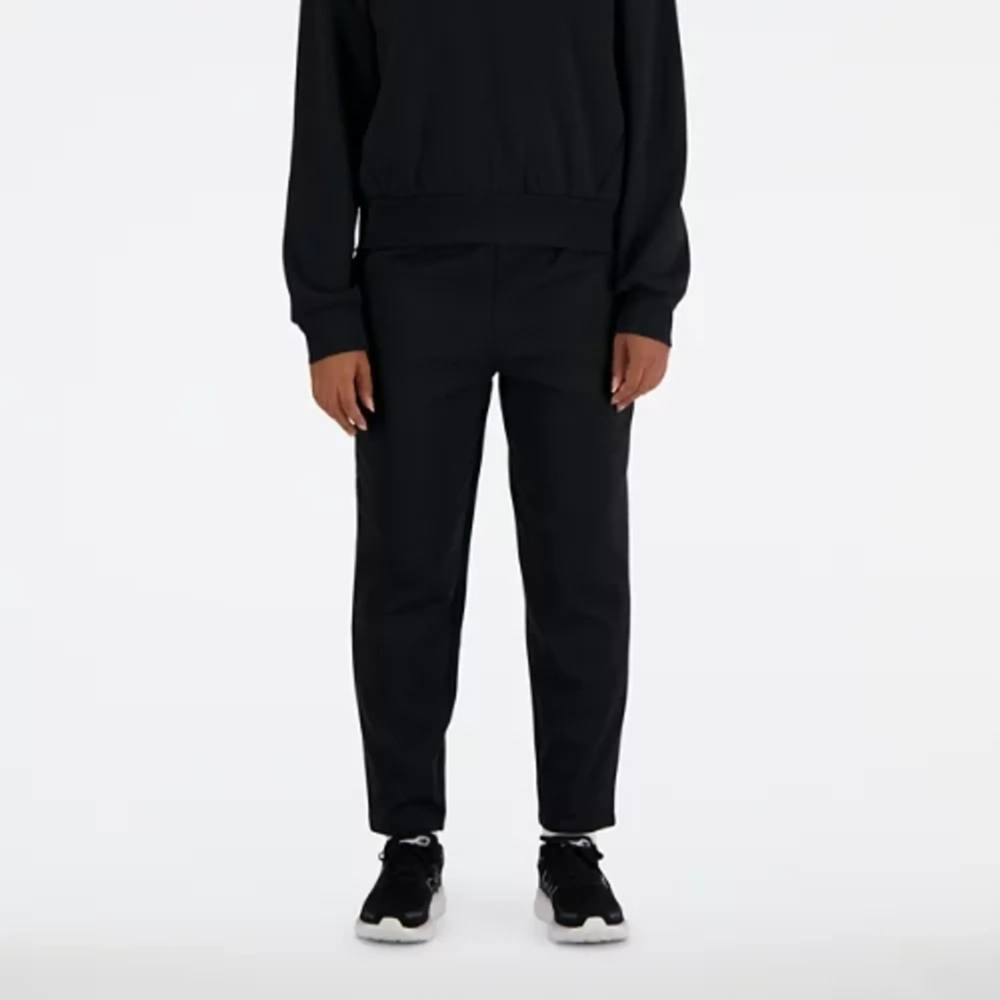 New Balance Women's Tech Knit Pant in Black Poly Knit